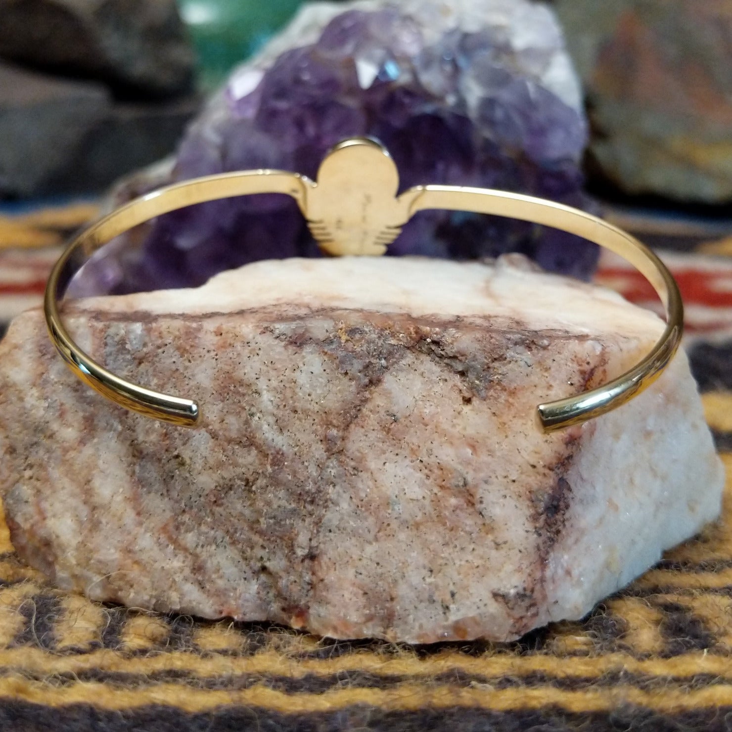 Interior view of handcrafted cuff showing band thickness and fit.