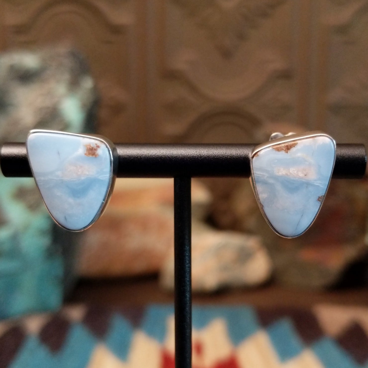 Sterling silver earrings with Arizona blue opal set in triangular bezels.