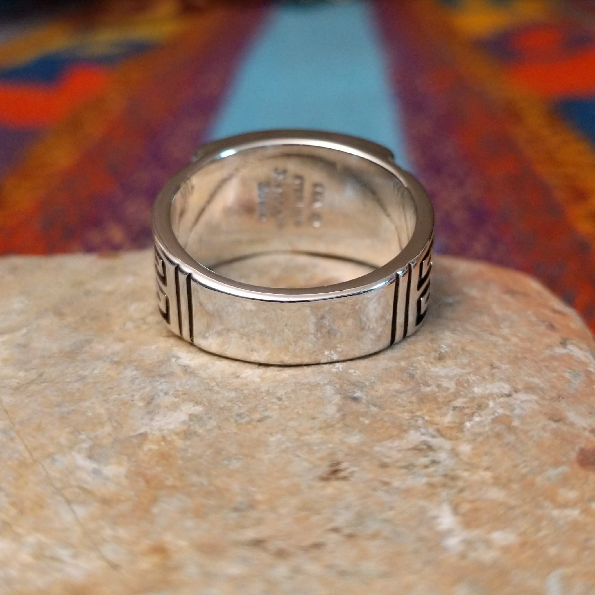 Black Onyx & Turquoise Inlay Ring by Kenneth Bitsie featuring polished black onyx and turquoise inlay separated by Sterling Silver channels; underside view.