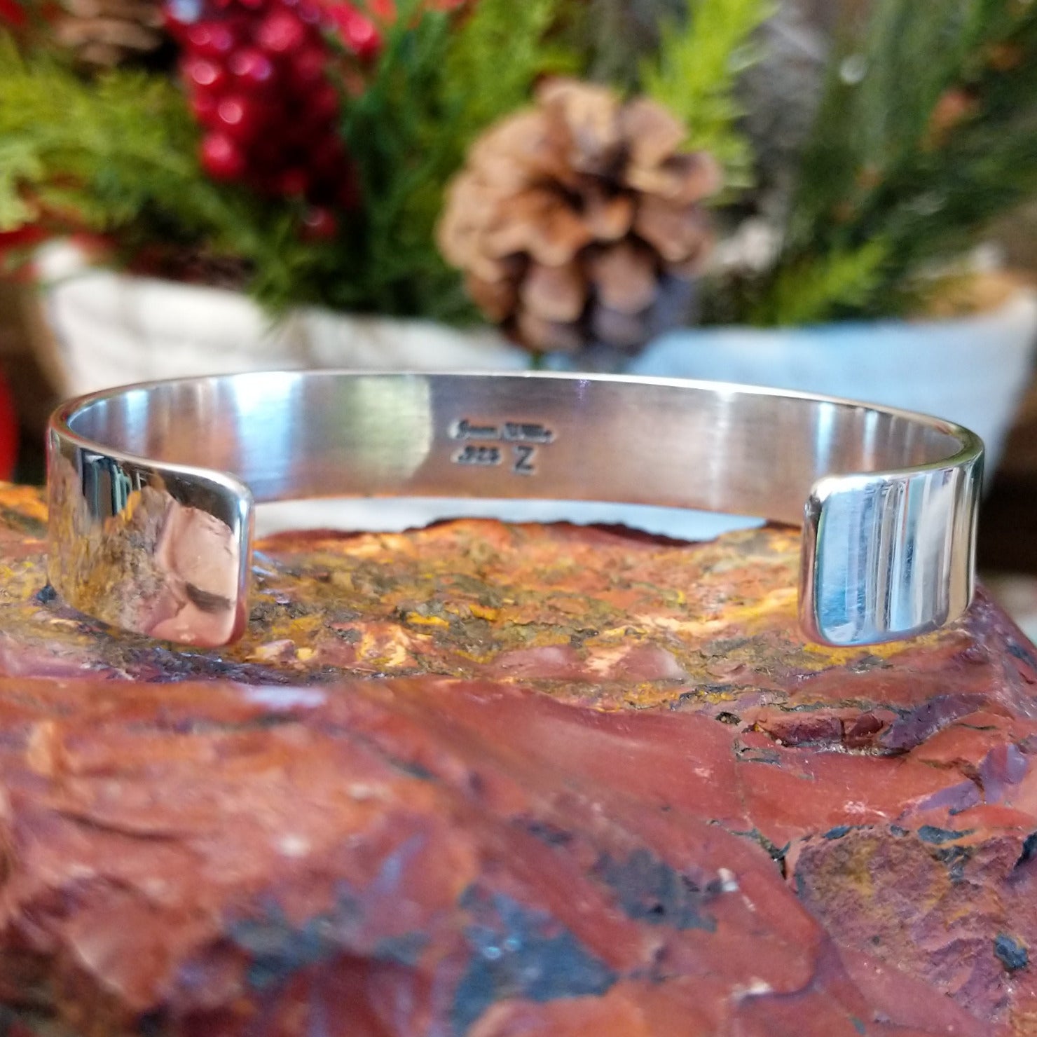 Sterling silver cuff bracelet with Carico Lake turquoise set in three bezels.