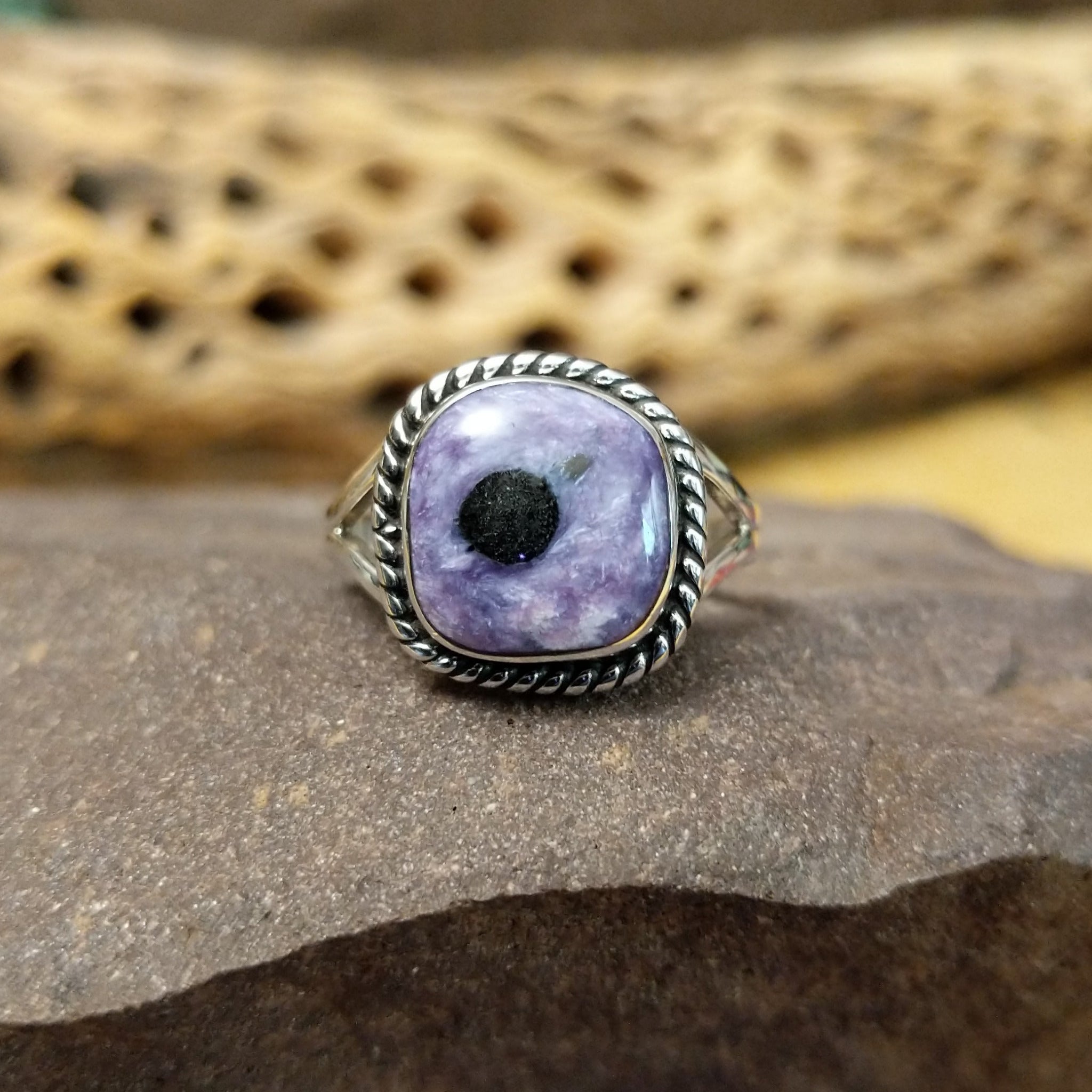 Charoite ring by Terry Wood, featuring a vibrant purple charoite stone with natural swirling patterns set in a handcrafted sterling silver band.