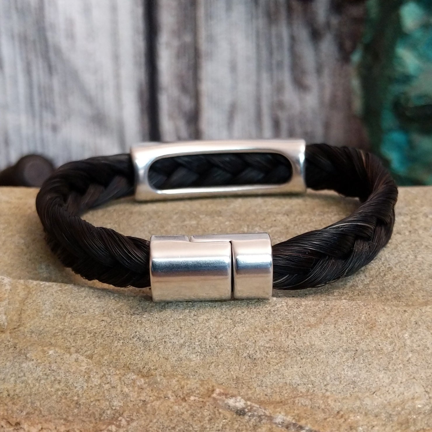 Close up of the magnetic clasp on the bracelet.