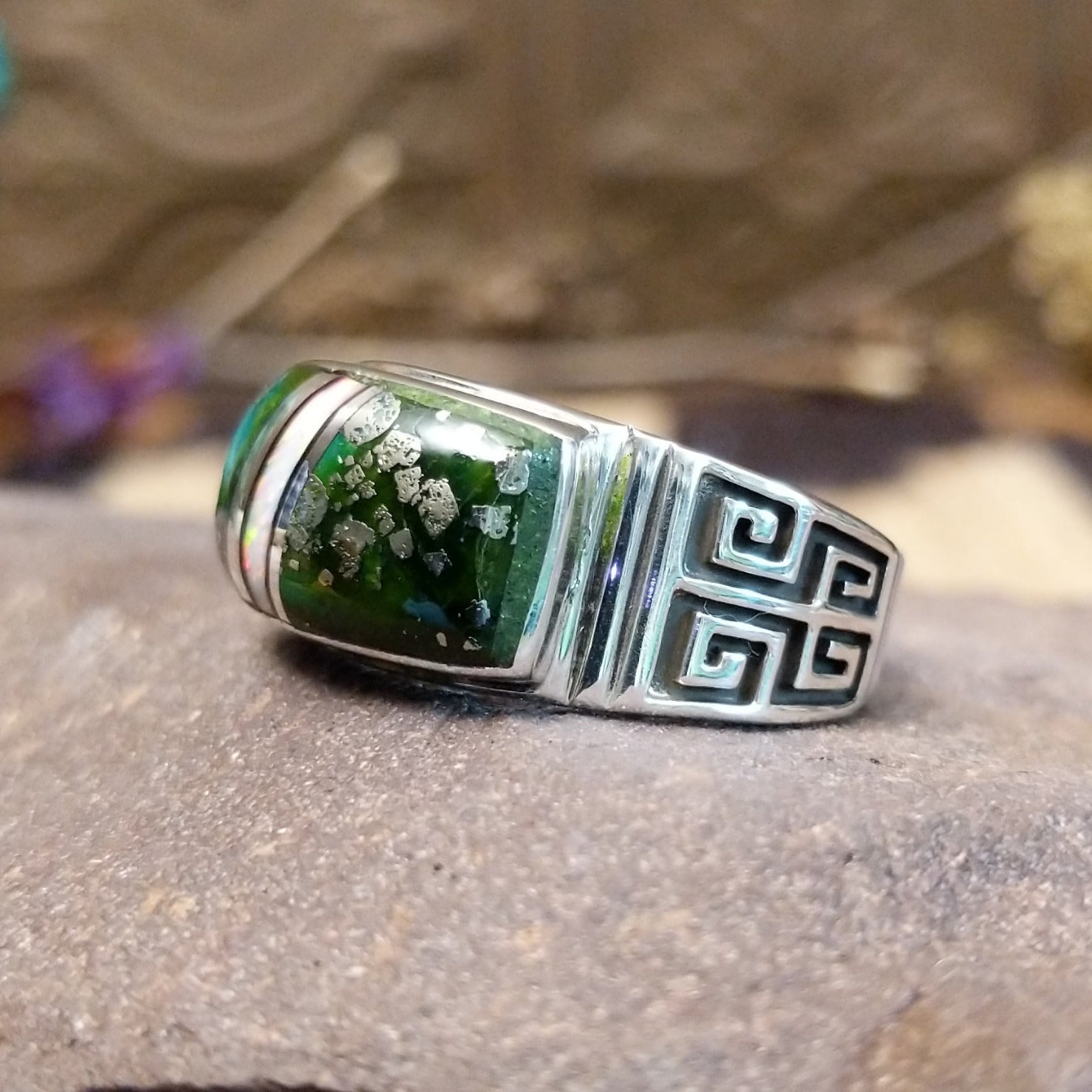Sterling silver ring with inlay of Sonoran gold turquoise and white manmade opal set in the square bezel.