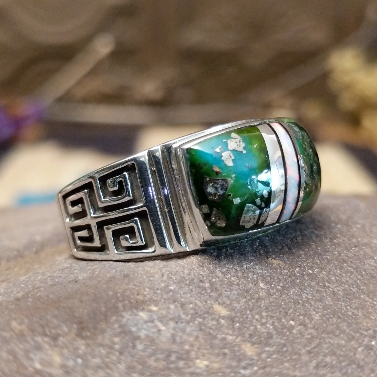 Sterling silver ring with inlay of Sonoran gold turquoise and white manmade opal set in the square bezel.