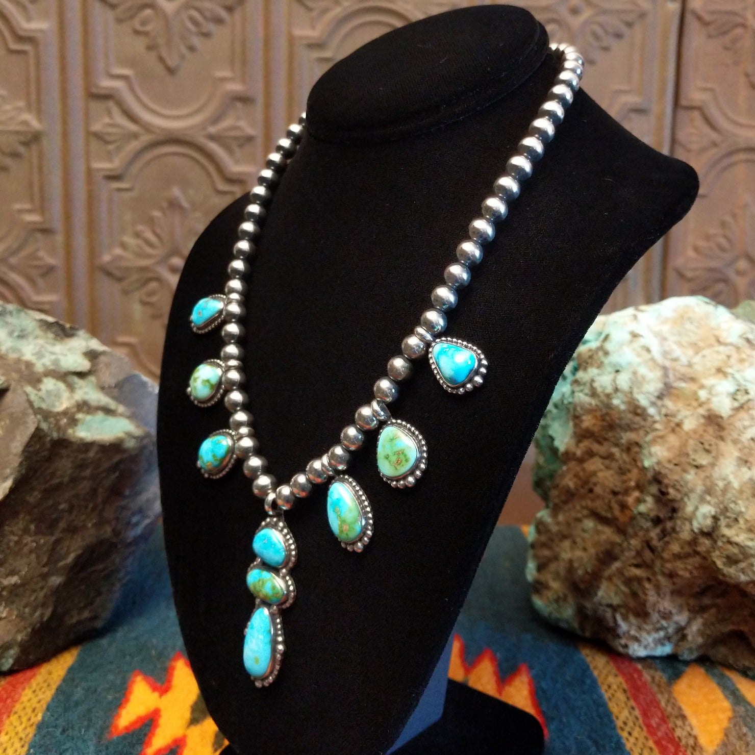Necklace with Sonoran Mountain turquoise set in bezels along the beaded silver chain.
