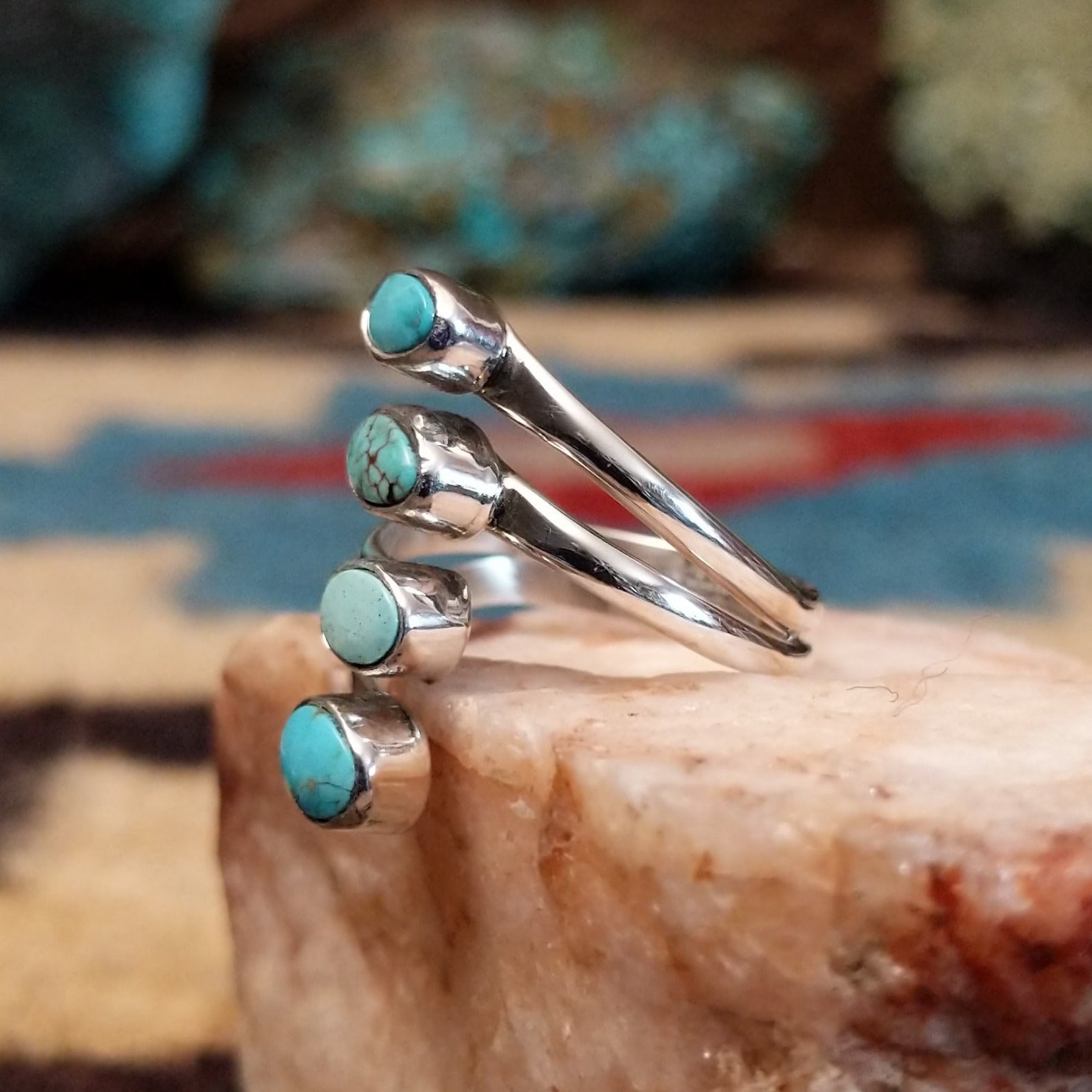 Sterling silver double strand ring with Dry Creek turquoise in oval bezels.