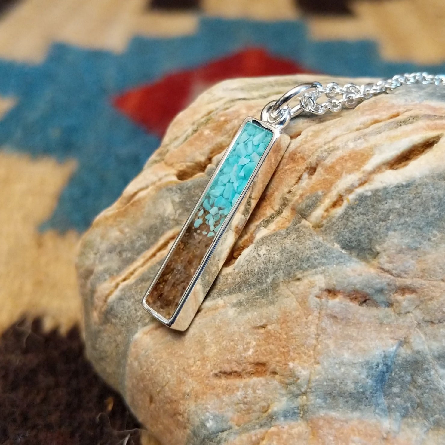 Silver-plated brass necklace with turquoise and San Pedro River sand set in the bar bezel.