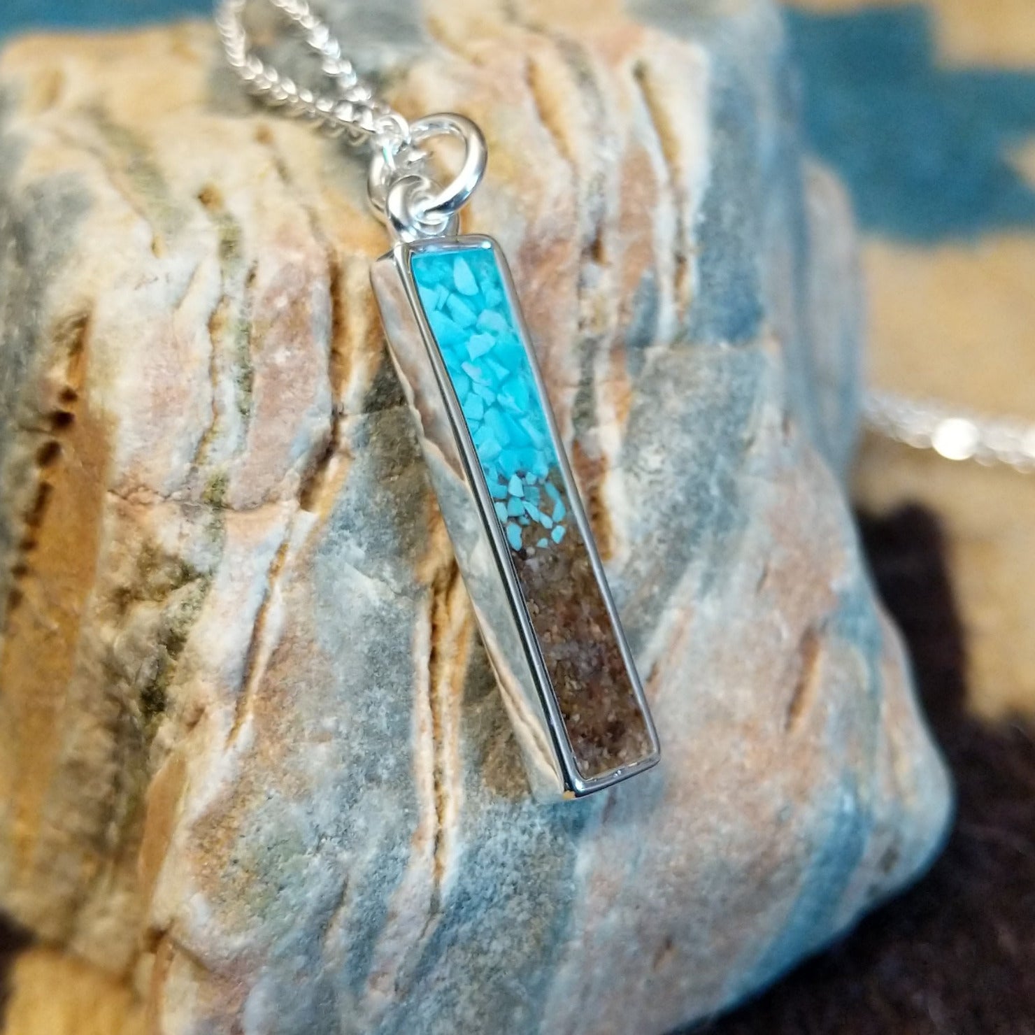 Silver-plated brass necklace with turquoise and San Pedro River sand set in the bar bezel.