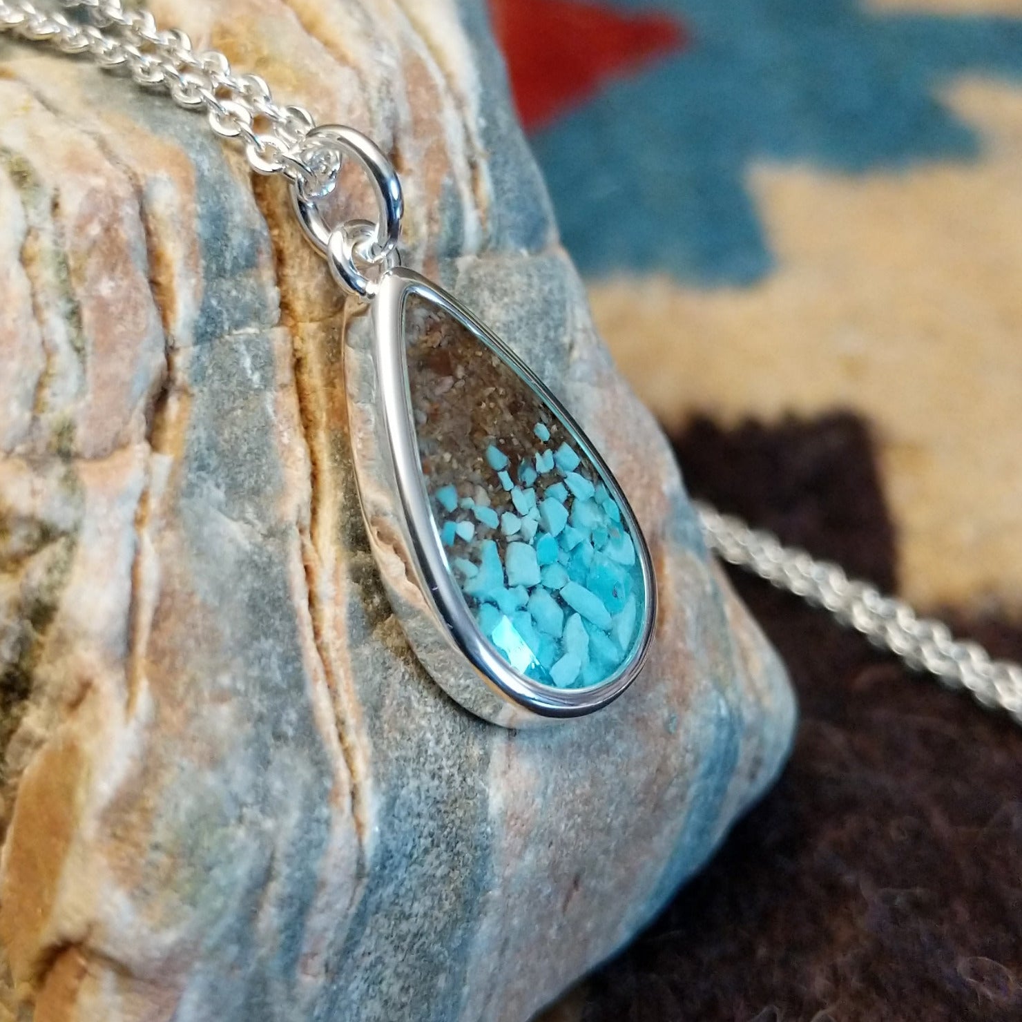 Silver-plated brass necklace with turquoise and San Pedro River sand set in the teardrop bezel.