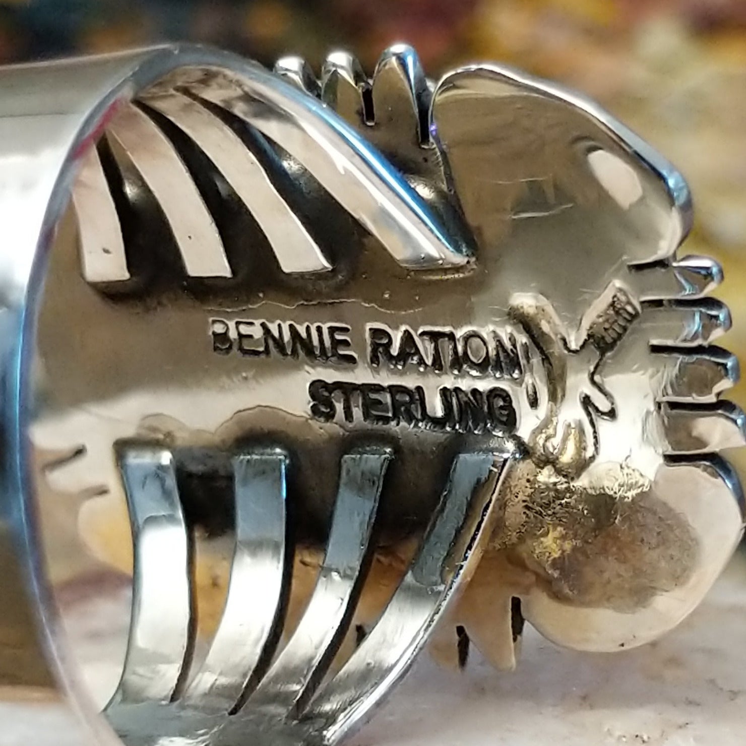 The artisan's stamped signature.
