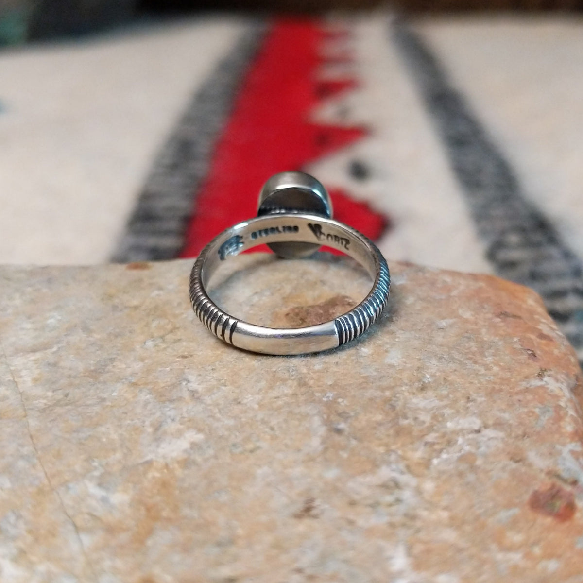 Golden Hills turquoise silver ring by Raymond Coriz with textured band.