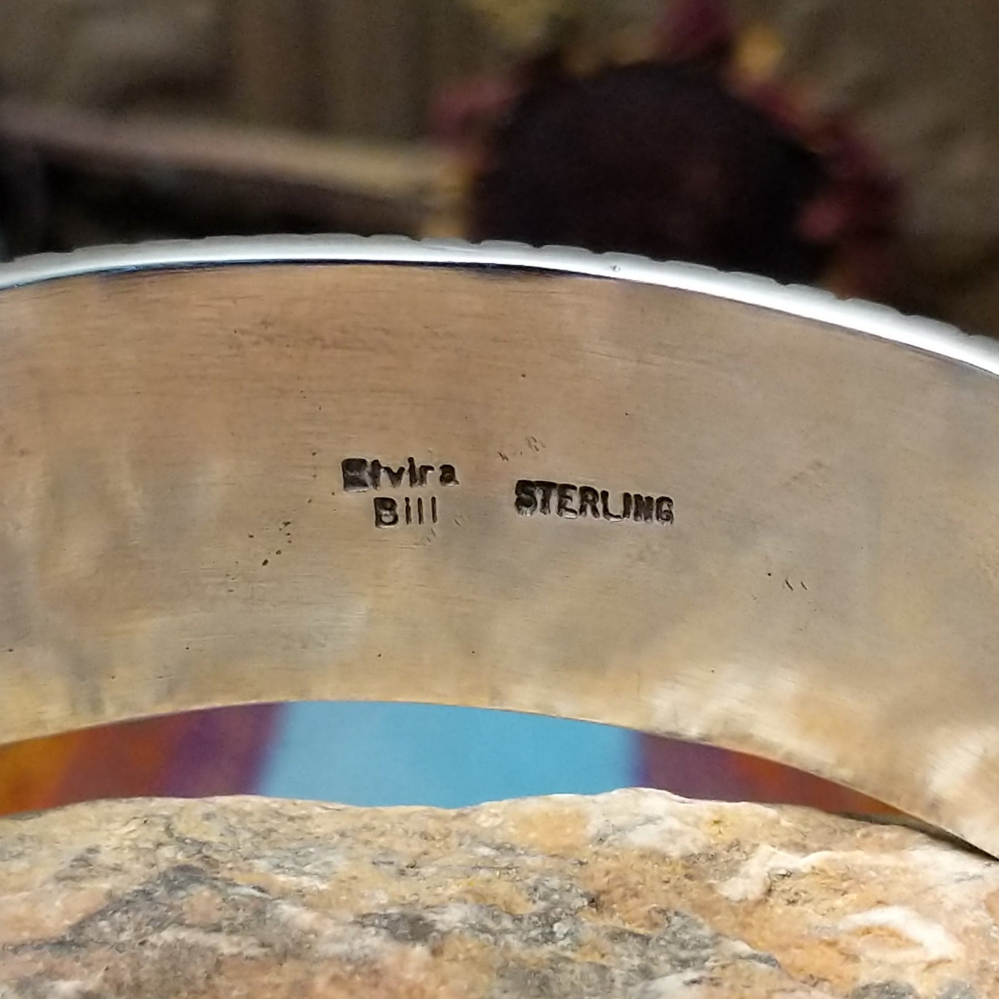 Close up of the artist's stamped signature
