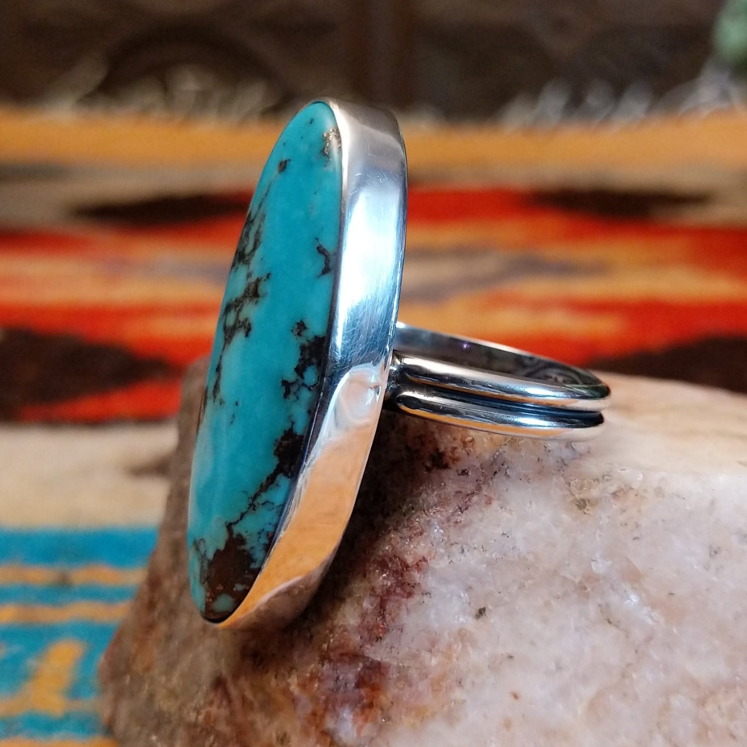 Sterling silver ring with Kingman turquoise set in the eclipse bezel.