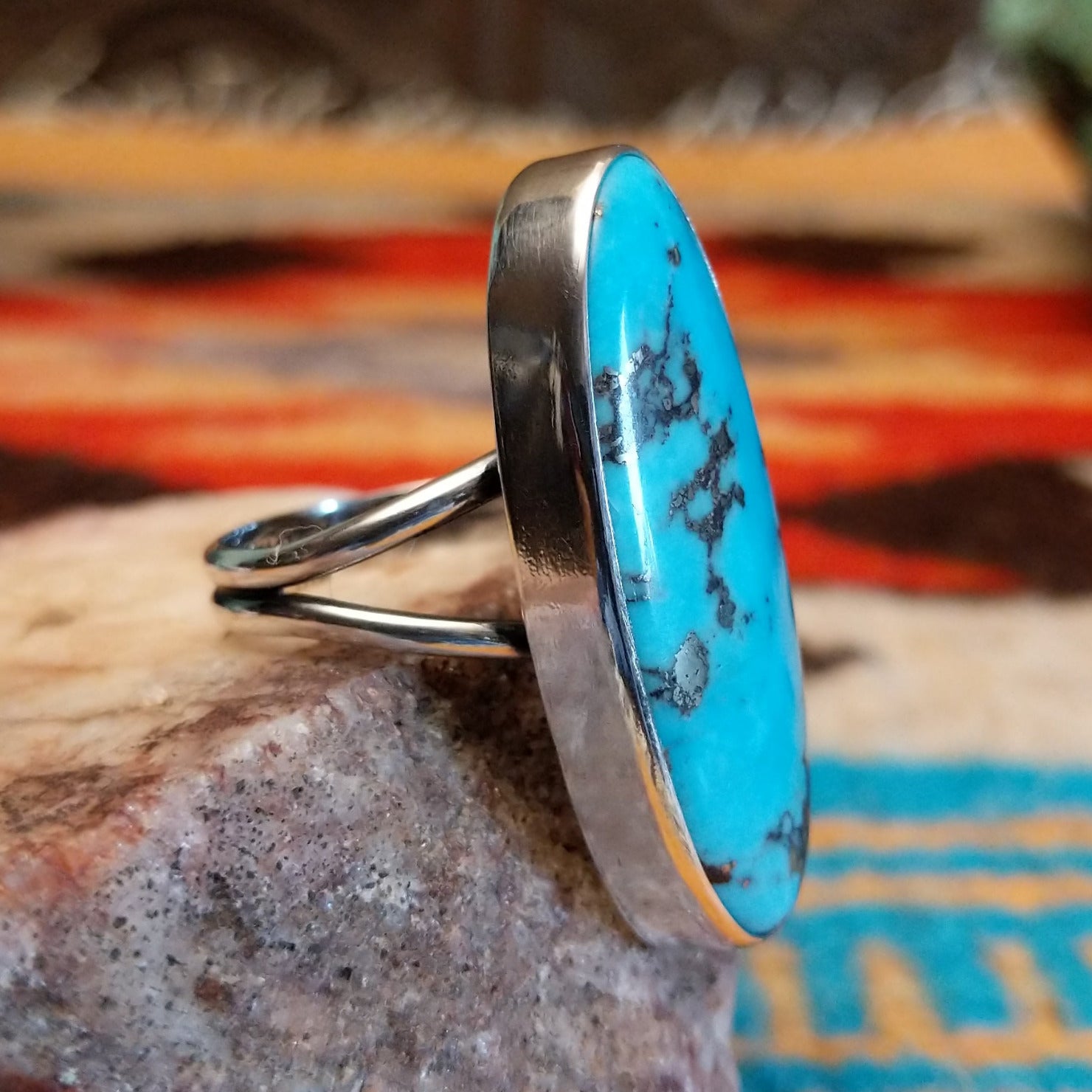 Sterling silver ring with Kingman turquoise set in the eclipse bezel.