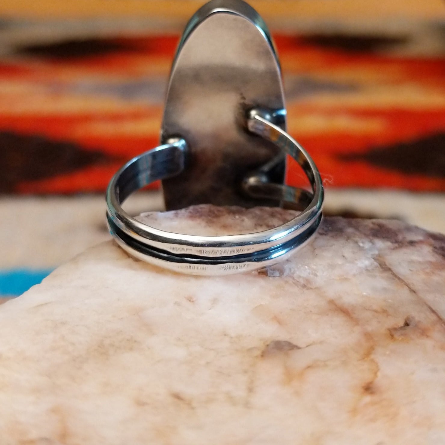 Sterling silver ring with Kingman turquoise set in the eclipse bezel.