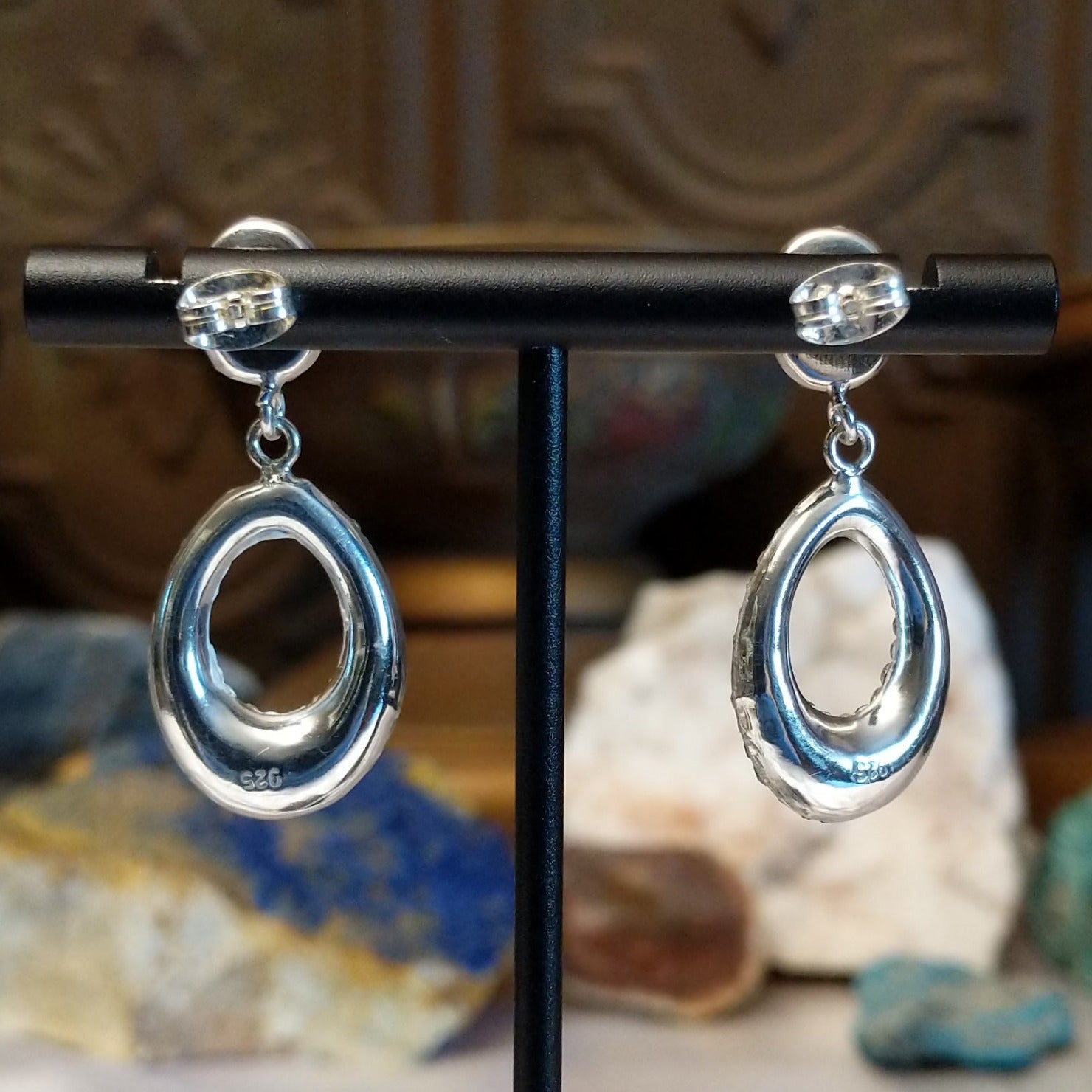 Austrian crystal loop earrings with multicolored crystals and sterling silver.