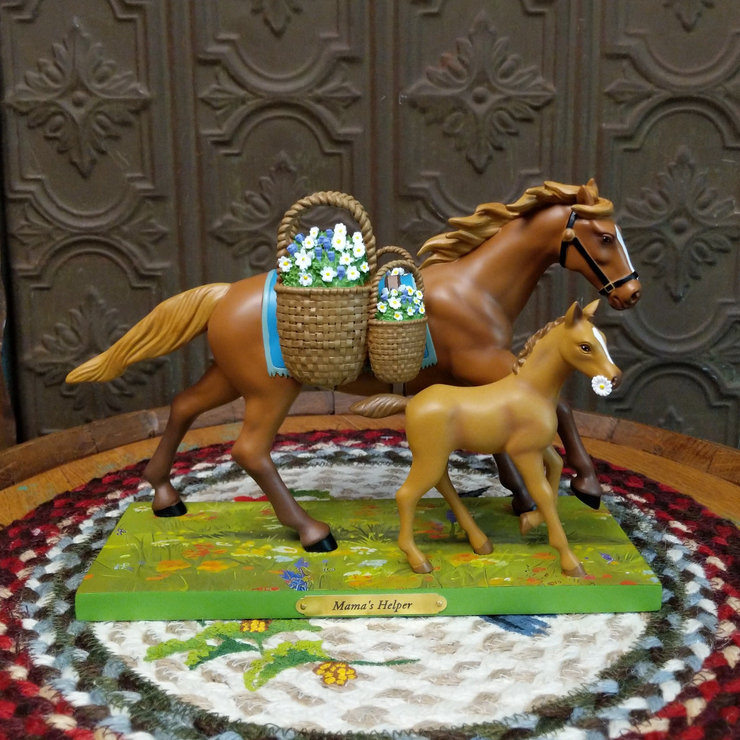 "Mama's Helper" collectible pony by The Trail of Painted Ponies, featuring detailed hand-painted artwork, vibrant colors, and family-inspired design elements.