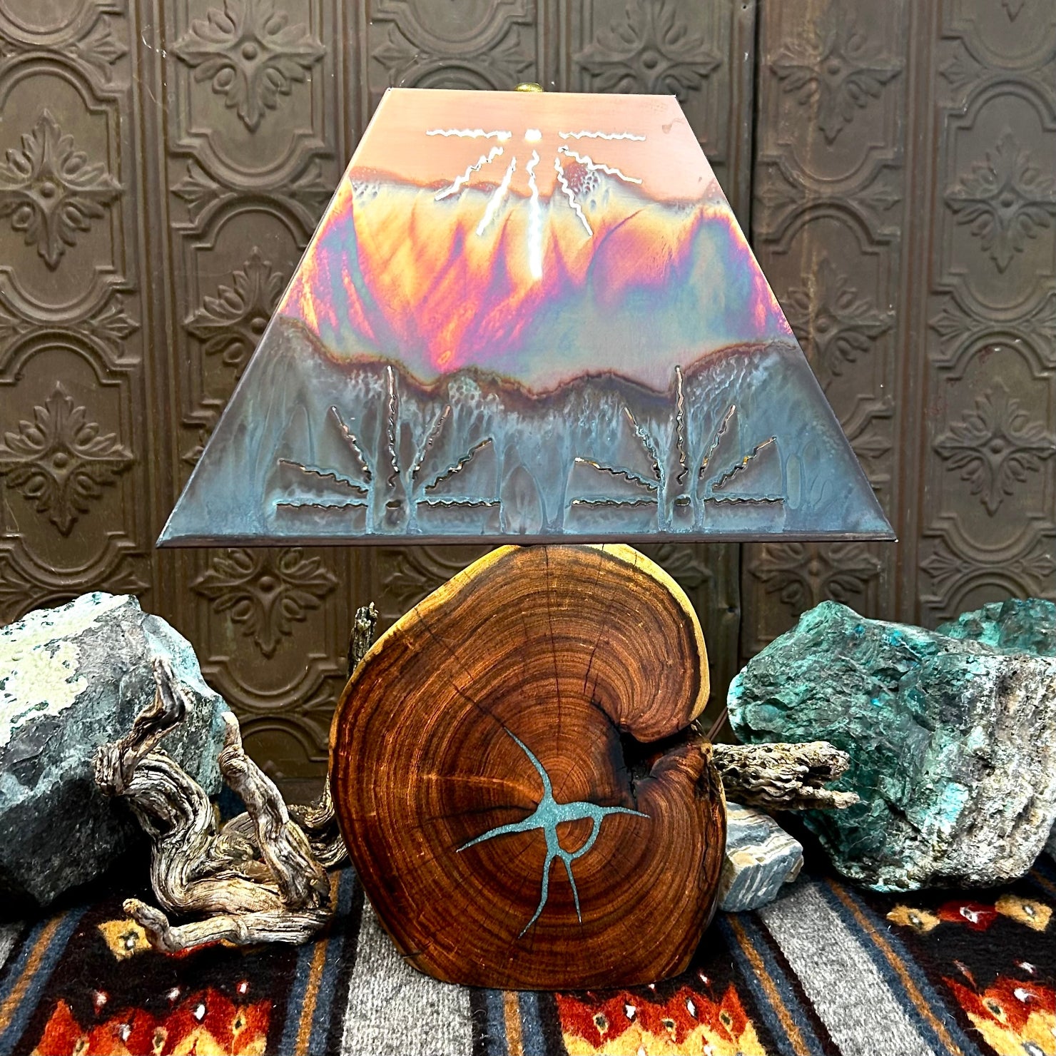 Mesquite wood base showcases natural turquoise inlays, topped with a copper shade.