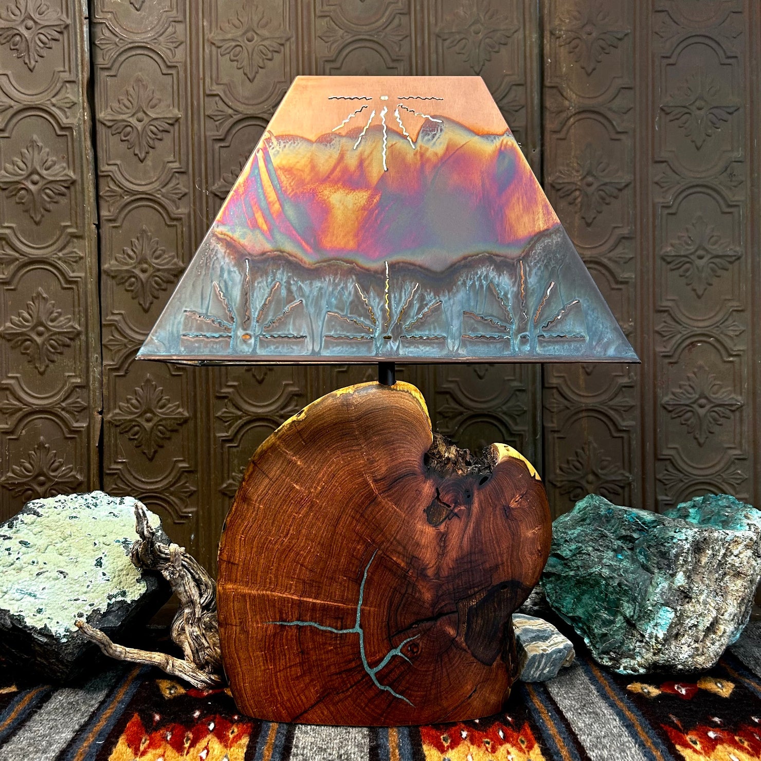 Mesquite wood base showcases natural turquoise inlays, topped with a copper shade.