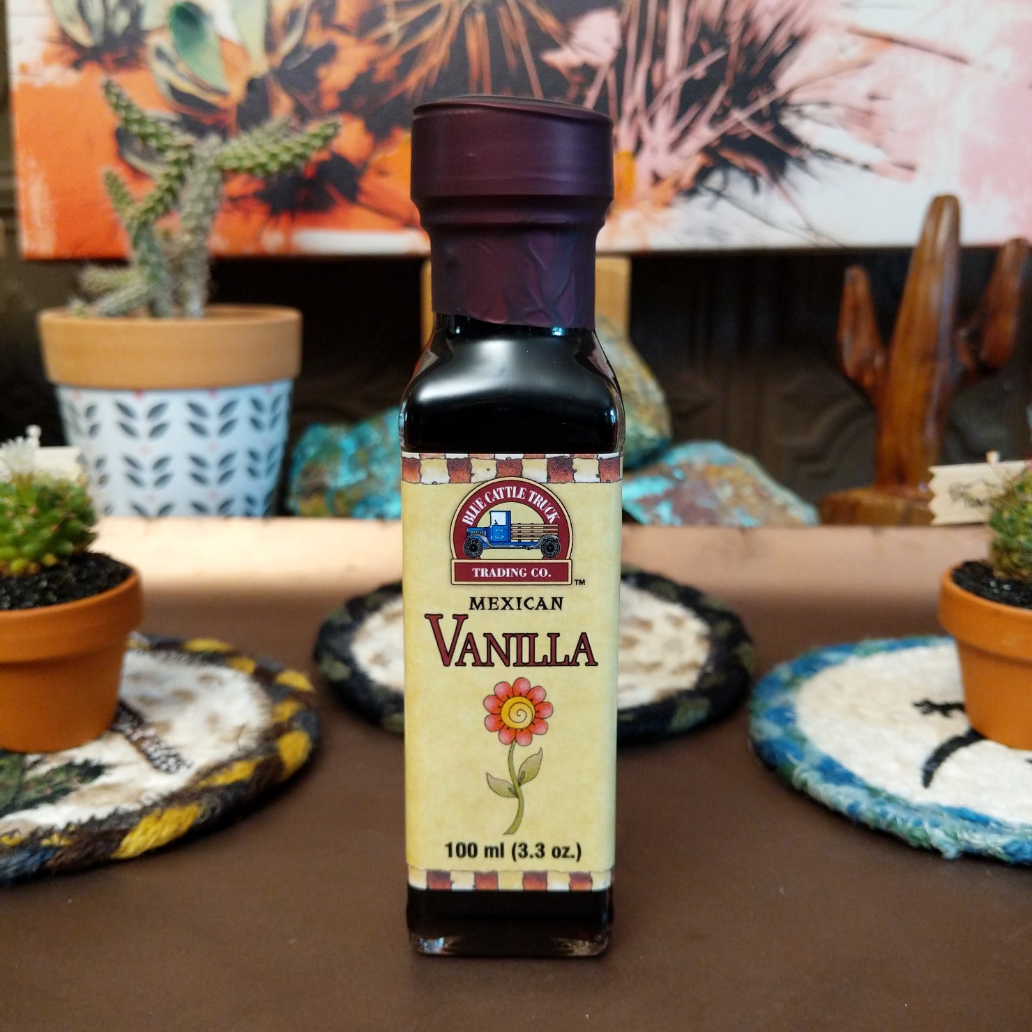 Bottle of authentic Mexican Vanilla featuring a rich amber color. Premium vanilla extract with a smooth, aromatic flavor, ideal for baking, cooking, coffee, desserts, and beverages.