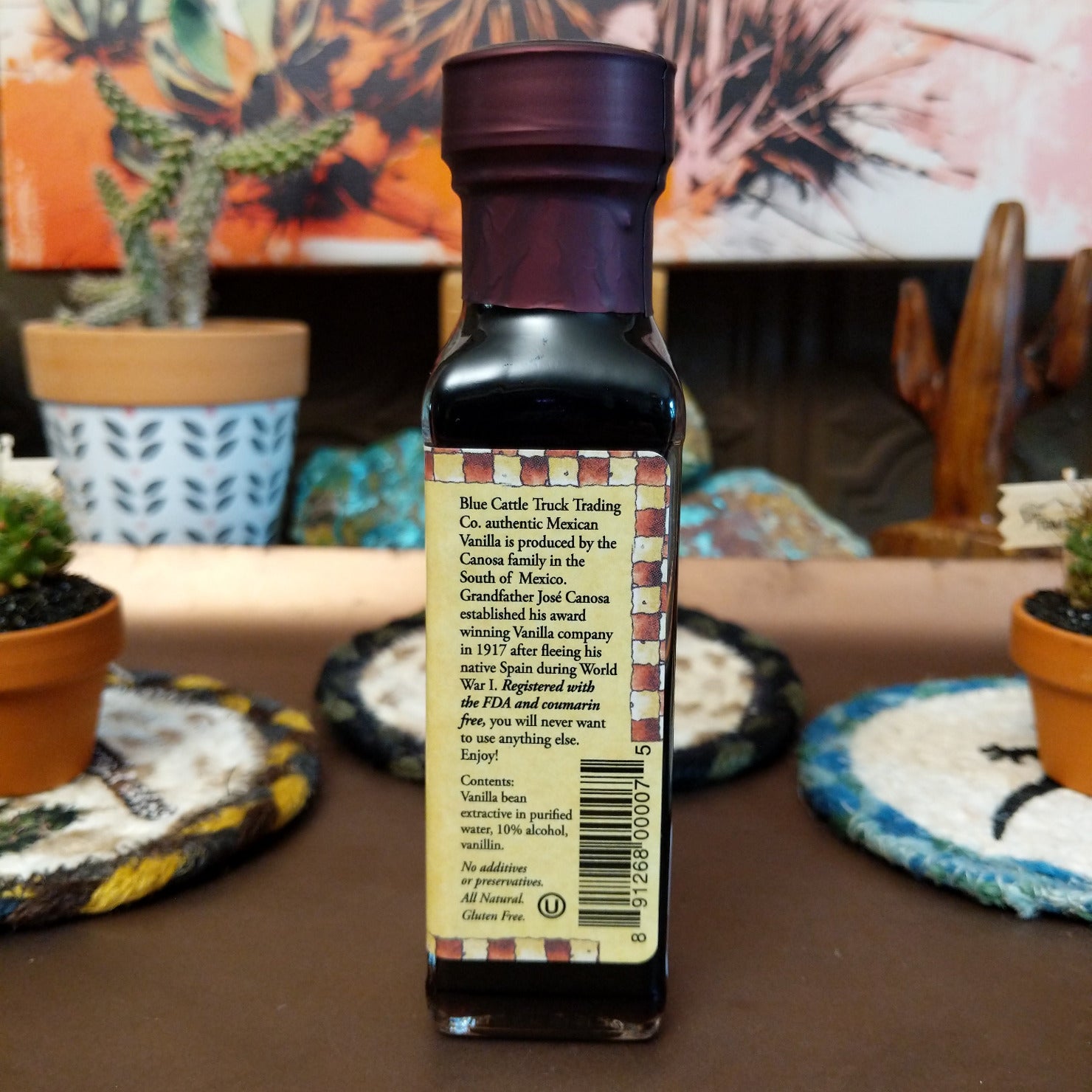Bottle of authentic Mexican Vanilla featuring a rich amber color. Premium vanilla extract with a smooth, aromatic flavor, ideal for baking, cooking, coffee, desserts, and beverages.