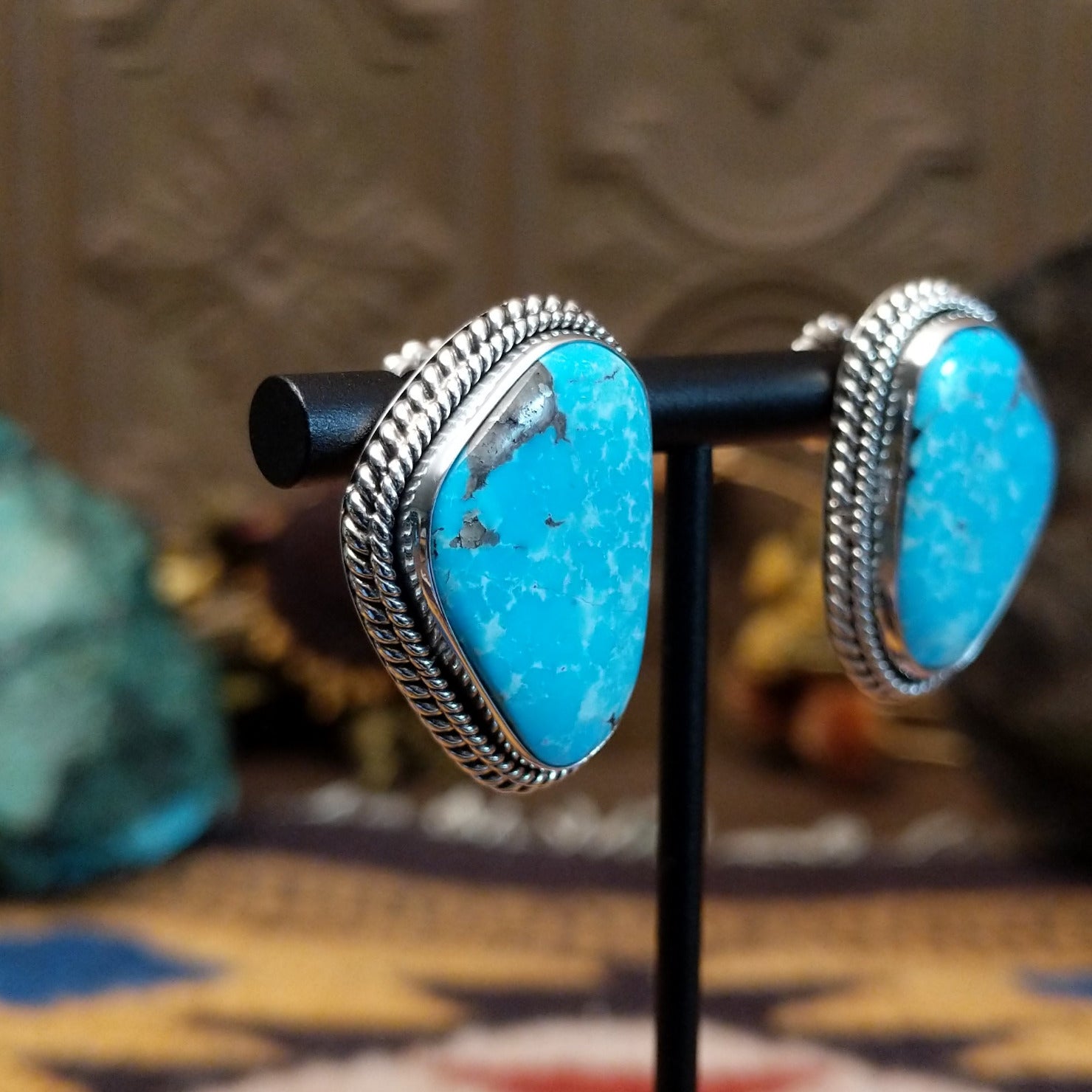 Sterling silver Morenci Turquoise stud earrings featuring freeform blue stones with natural matrix and twisted rope detailing.