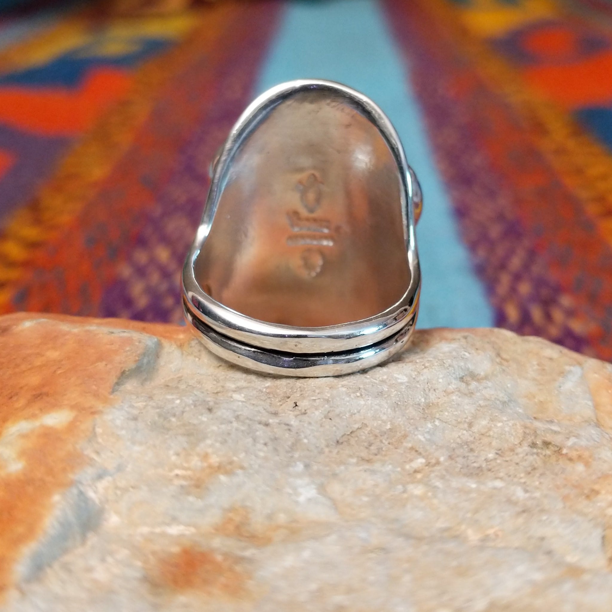 Multistone Cluster Ring by Raymond Coriz featuring turquoise, coral, lapis, and orange-toned stones set in Sterling Silver with polished silver bead accents; underside view.