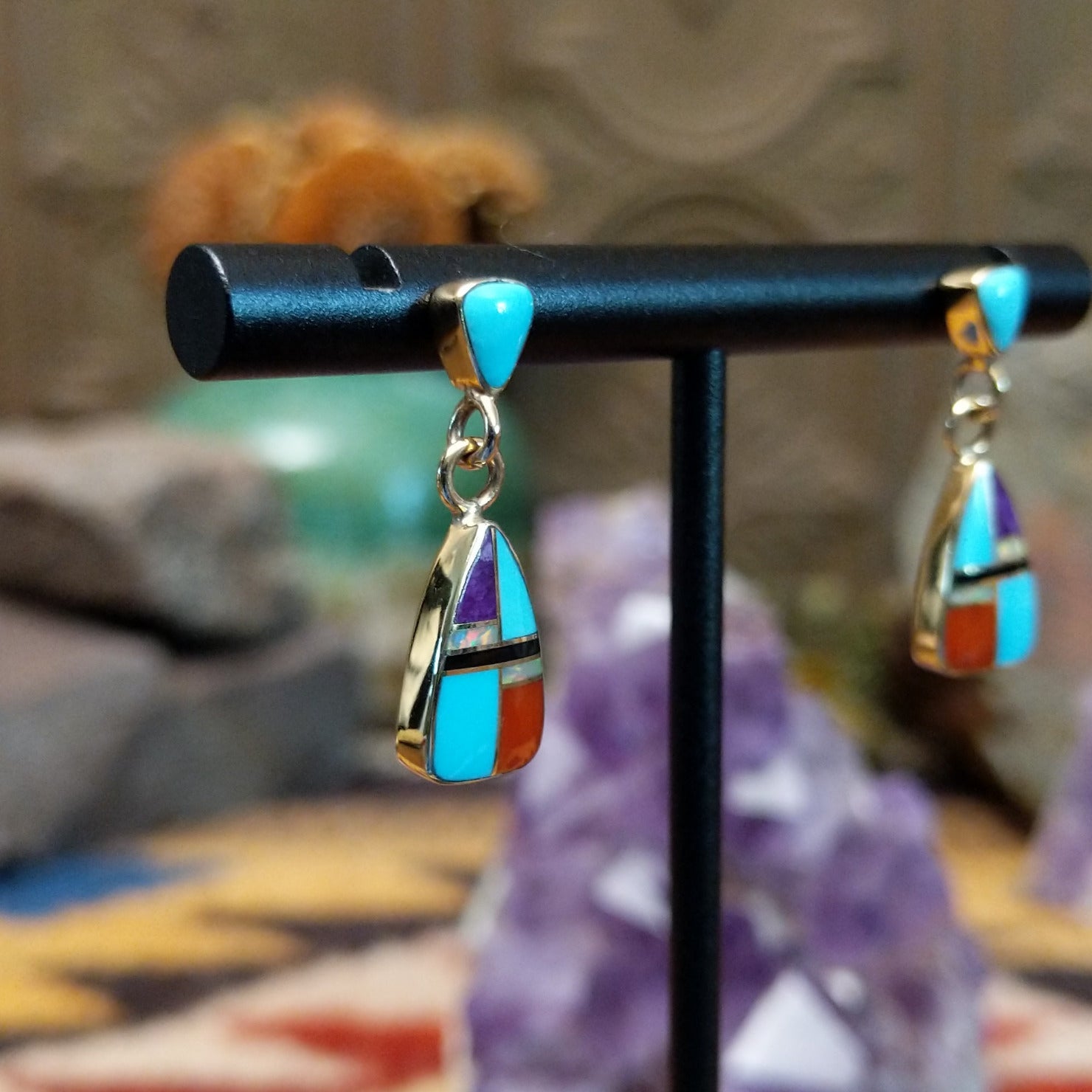 14kt gold Virgil Reeder earrings with geometric multistone teardrop inlay.