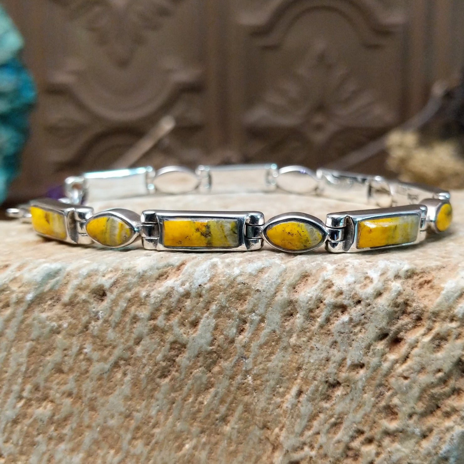 Sterling silver link bracelet with bumblebee jasper set in geometric bezels.