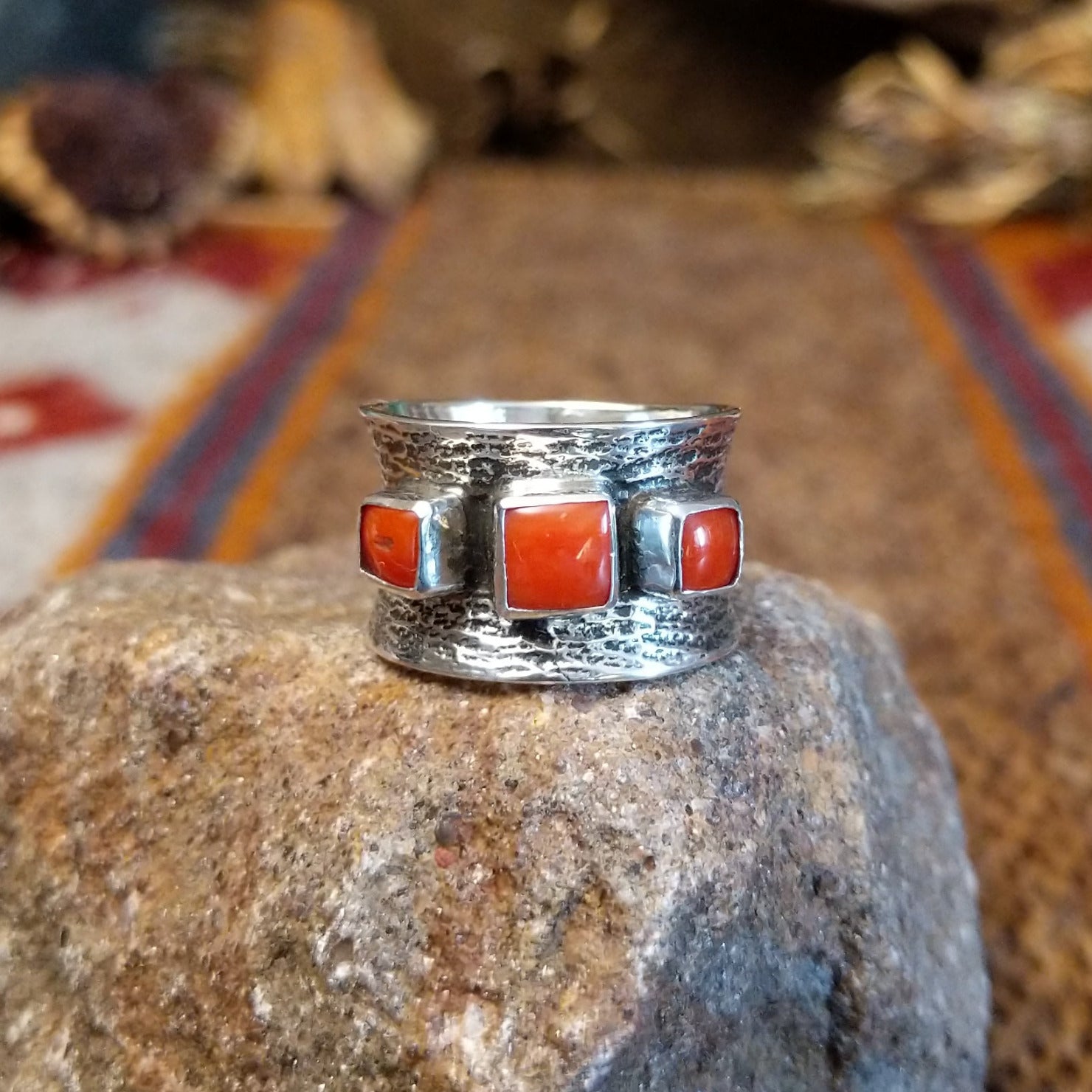 Sterling silver ring with coral set in square bezels.