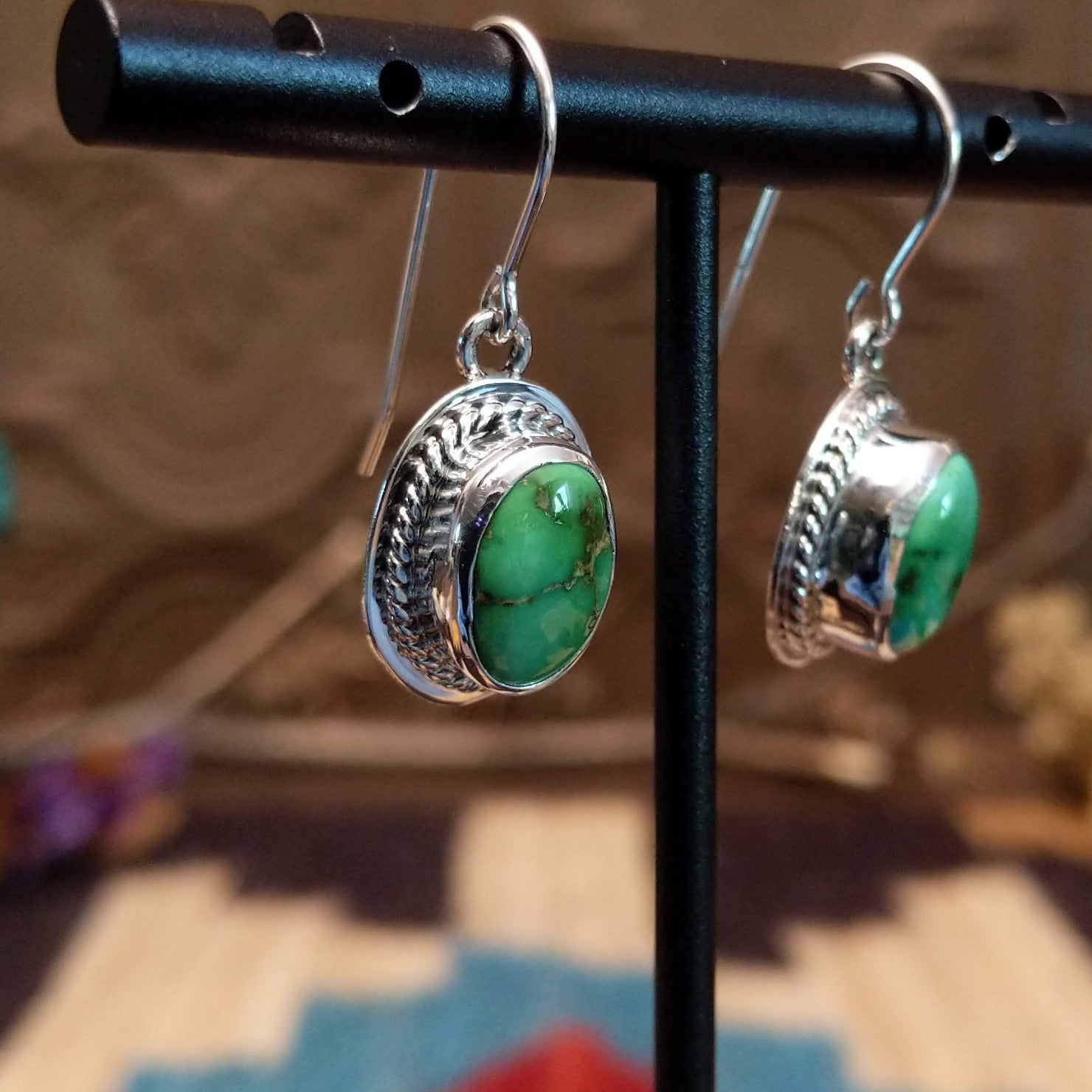 Sterling silver earrings with Sonoran gold turquoise set in raised bezels, framed by twisted rope.