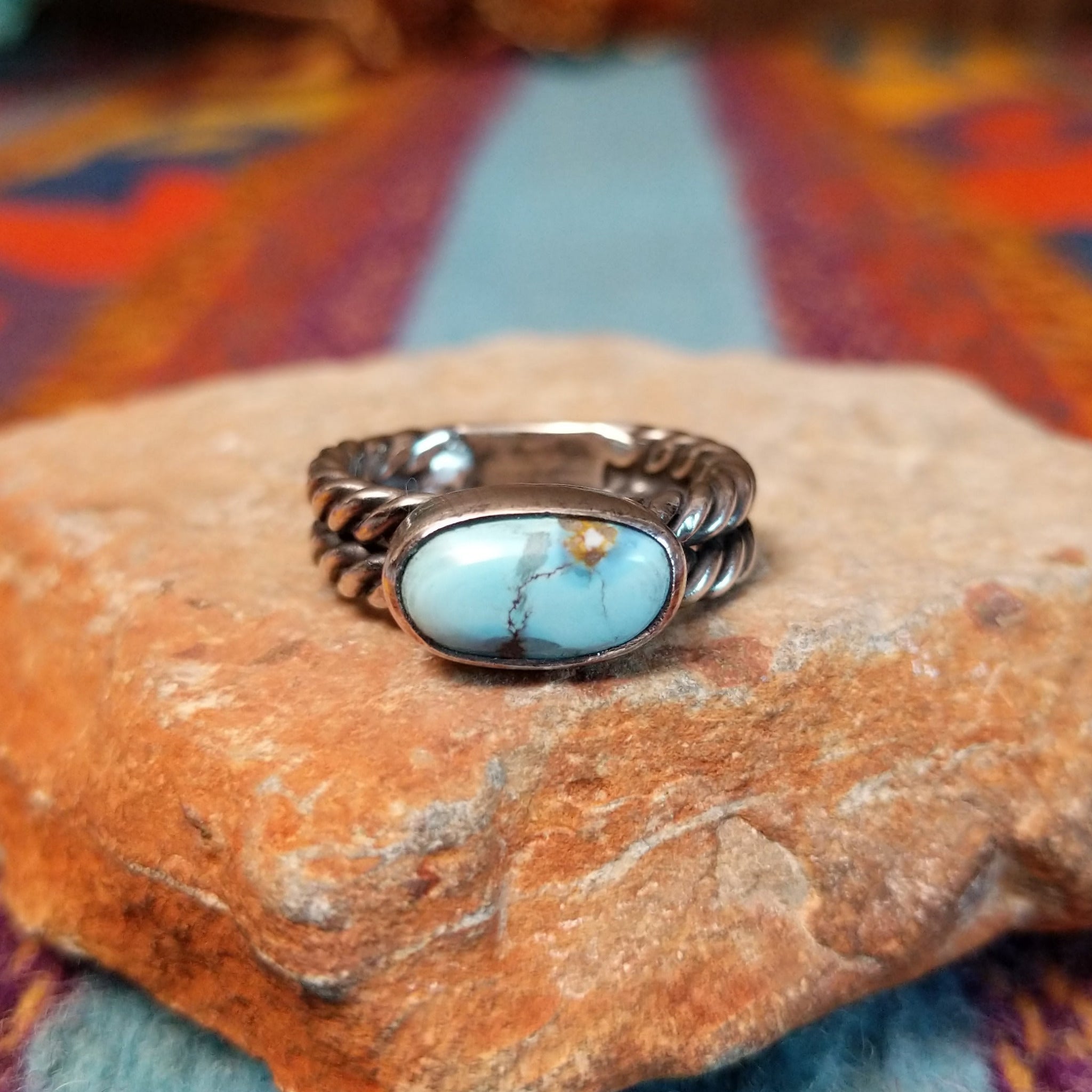 Navajo silver ring with oval Golden Hills turquoise and double twisted band.