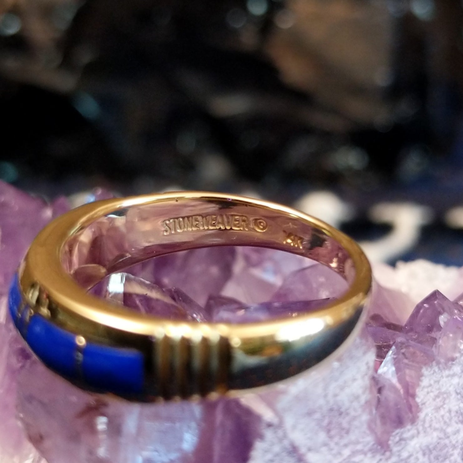 The gold and maker's mark stamped into the inside of the ring.