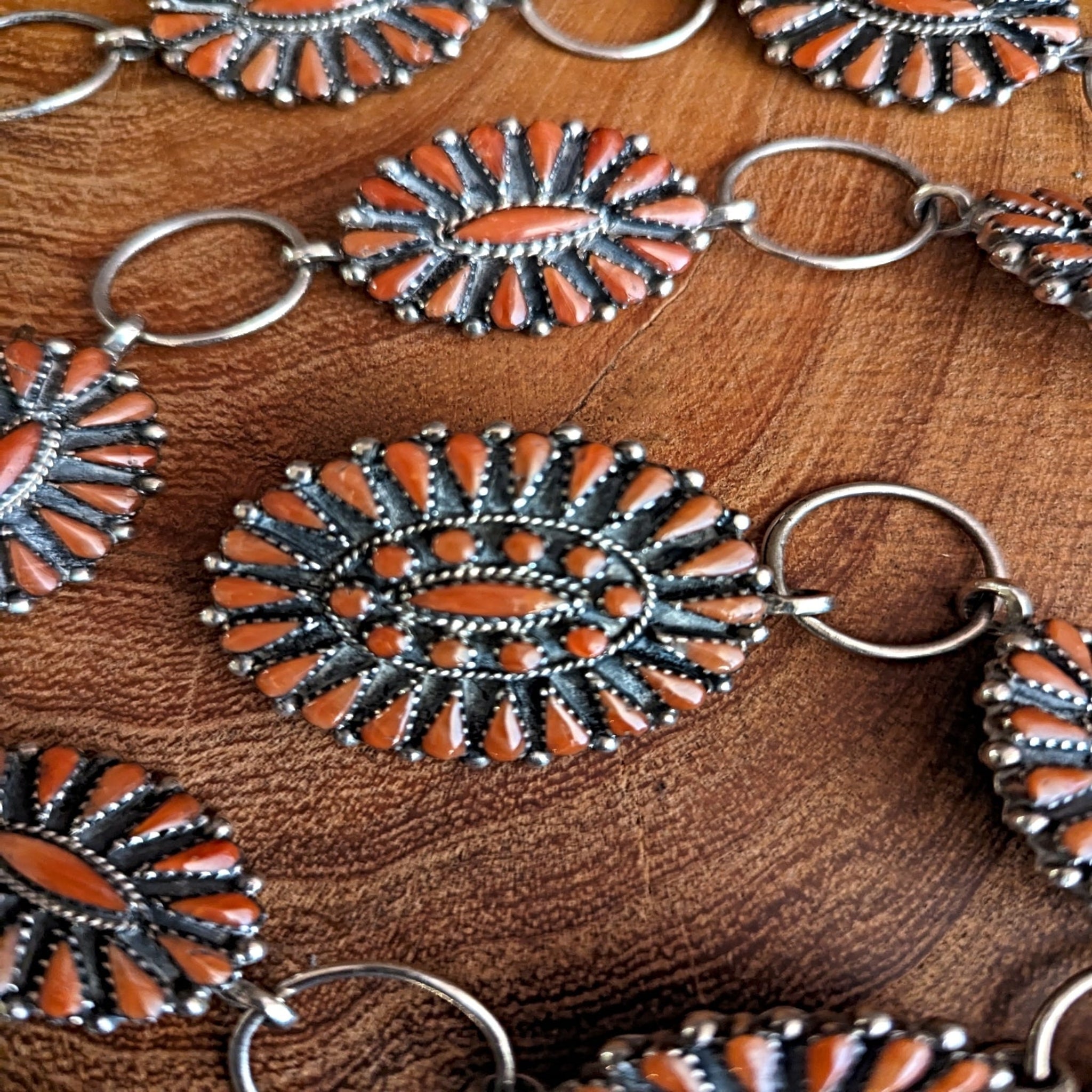 close up buckle coral concho belt