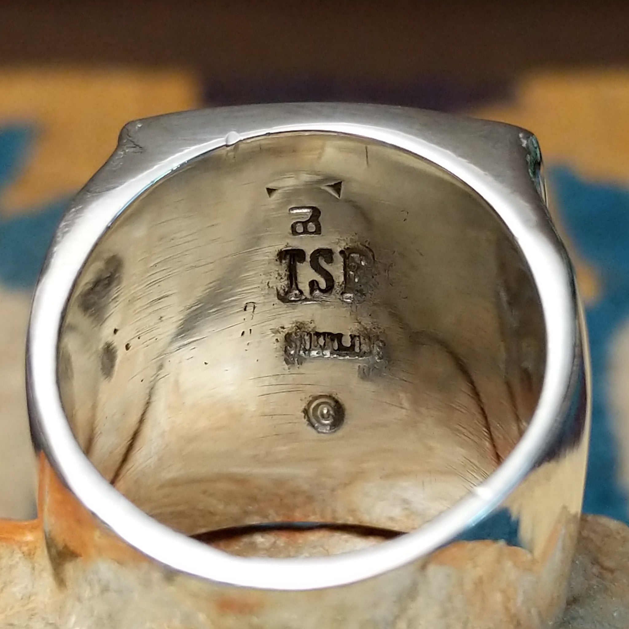 Handcrafted Navajo sterling silver ring by B.J. featuring a bold geometric inlay design in a polished silver setting with a contemporary Southwestern style; artisan and Sterling Silver stamp.