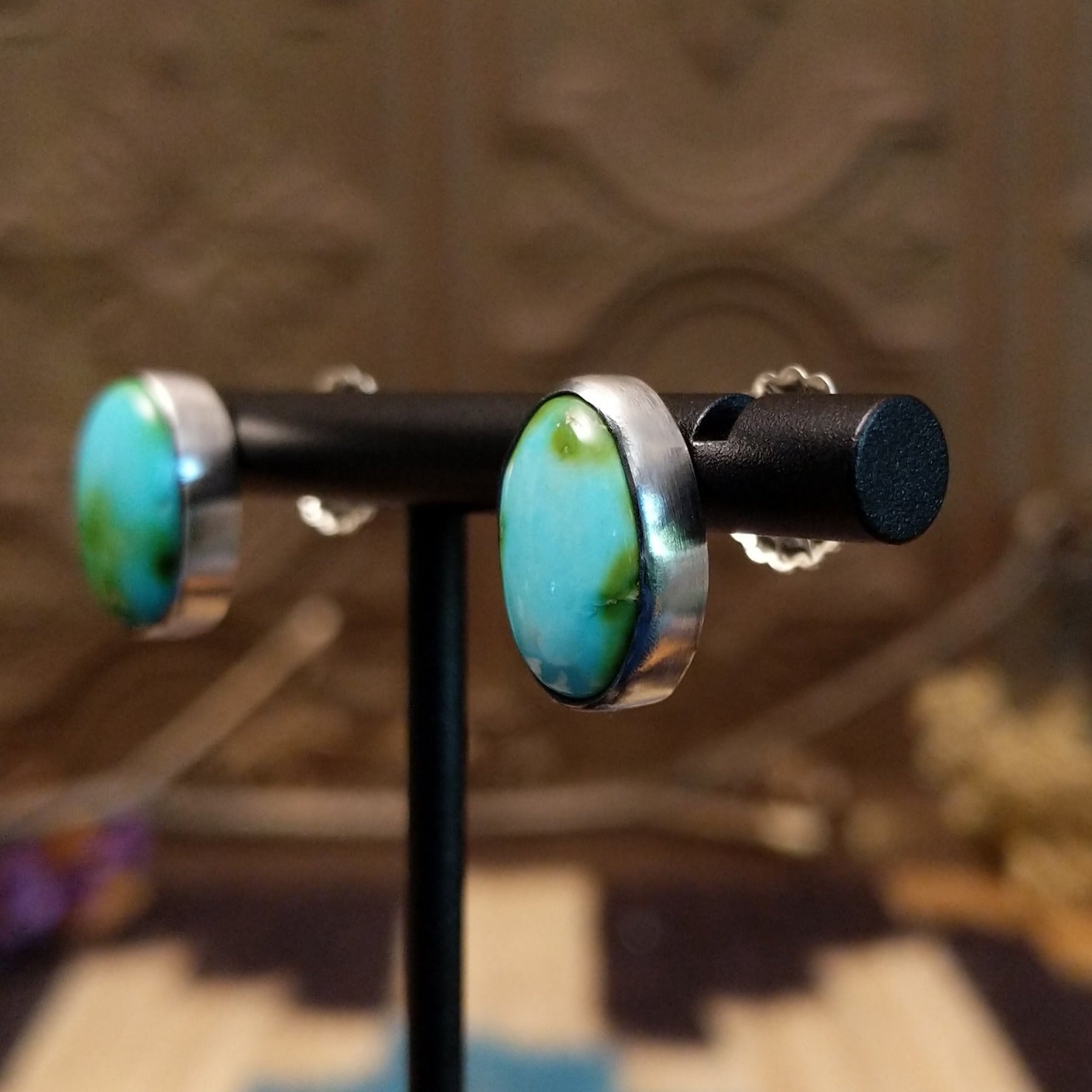 Sterling silver earrings with Sonoran gold turquoise set in oval bezels.