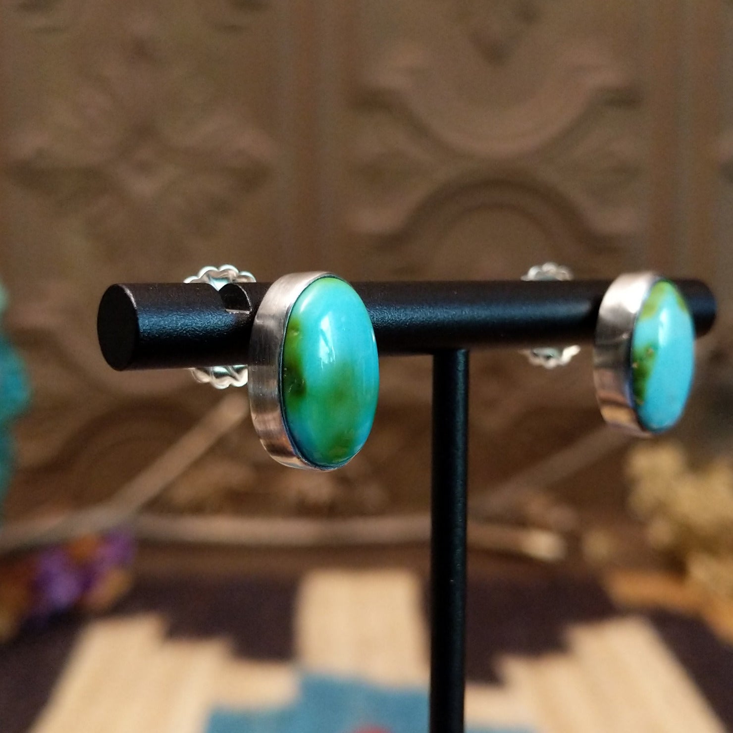 Sterling silver earrings with Sonoran gold turquoise set in oval bezels.