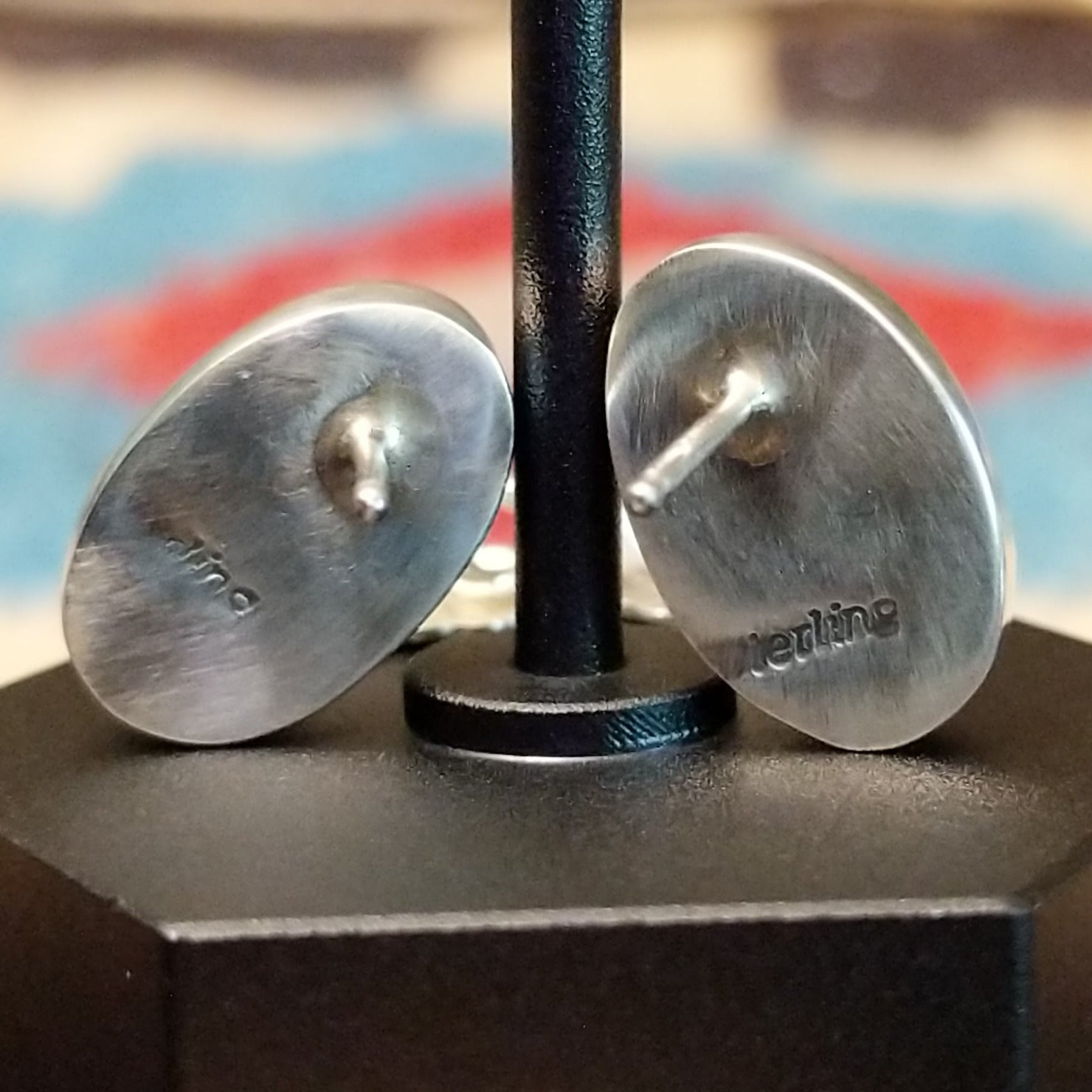 Close-up of the artisan's stamped signature.