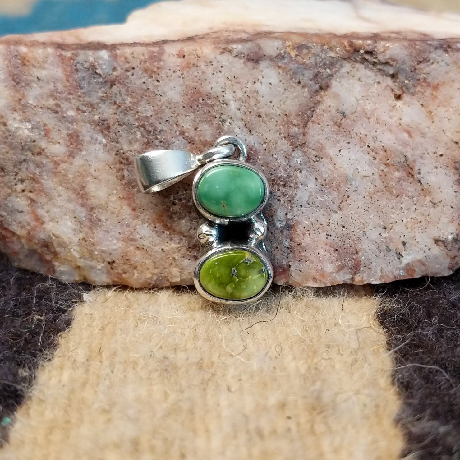 Sterling silver pendant with Sonoran gold turquoise set in the stacked bezel.