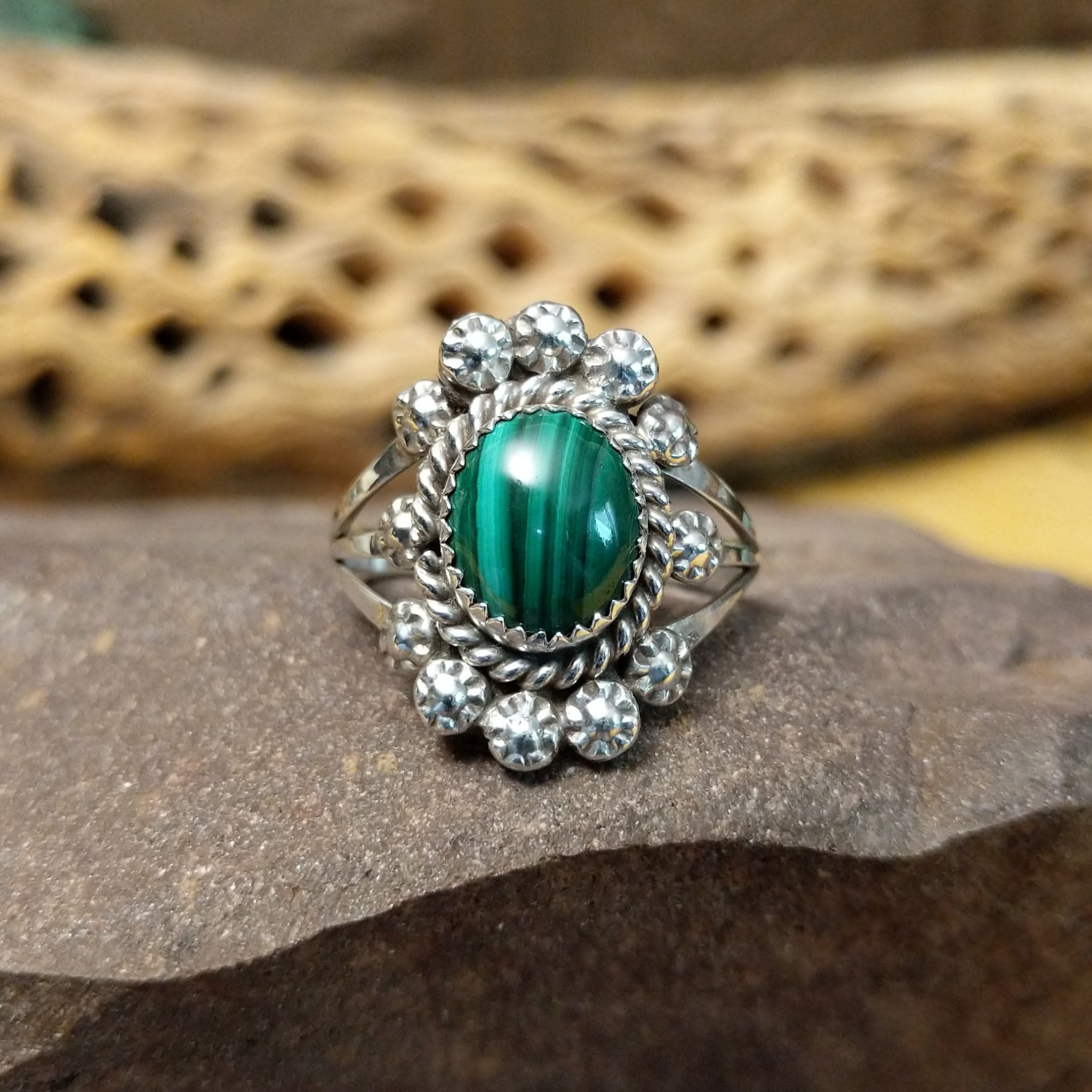 Navajo Starry malachite ring, featuring a vibrant green malachite stone with natural banding set in a handcrafted sterling silver band with Southwestern-inspired metalwork.