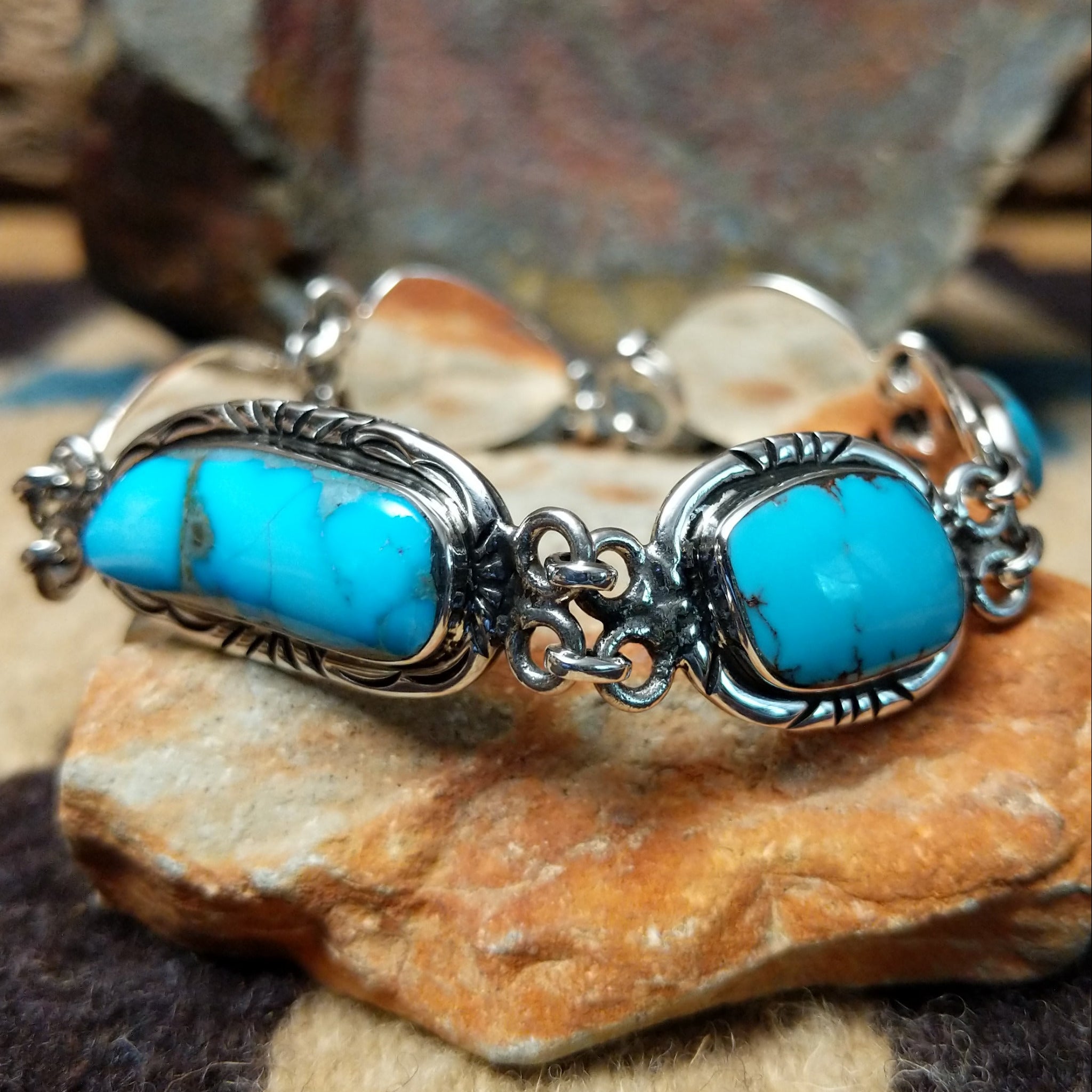 Navajo turquoise link bracelet by A.P. with natural turquoise stones set in handcrafted sterling silver.