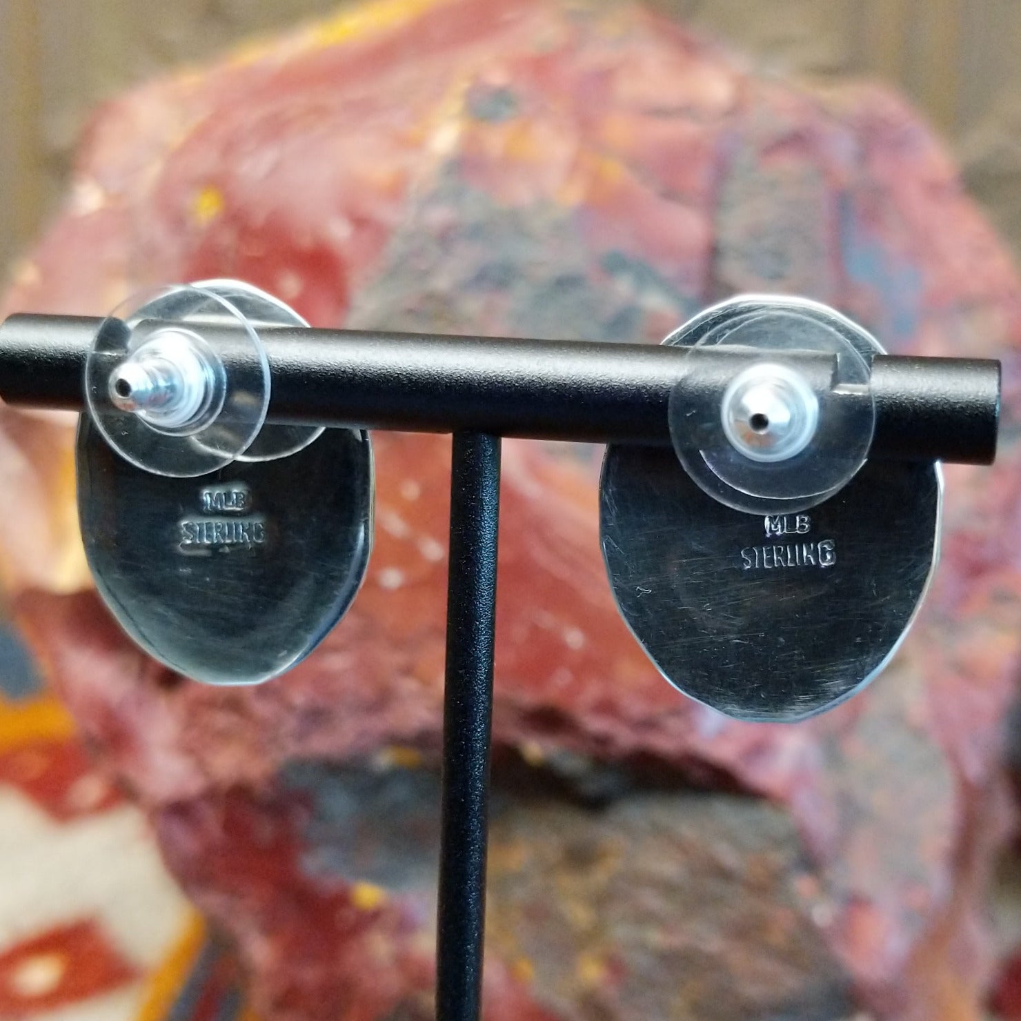 Close-up of the artisan's stamped signature.