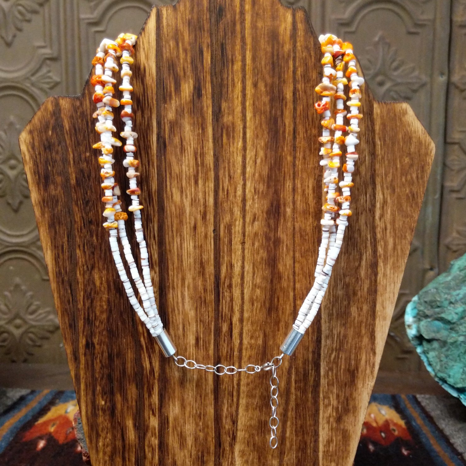 The back of the necklace showcases the adjustable sterling silver chain with clasp.