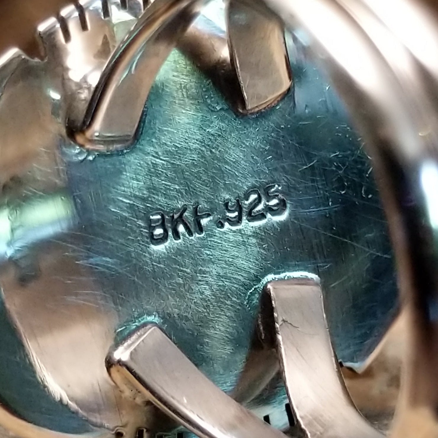 Close-up of the artisan's stamp.