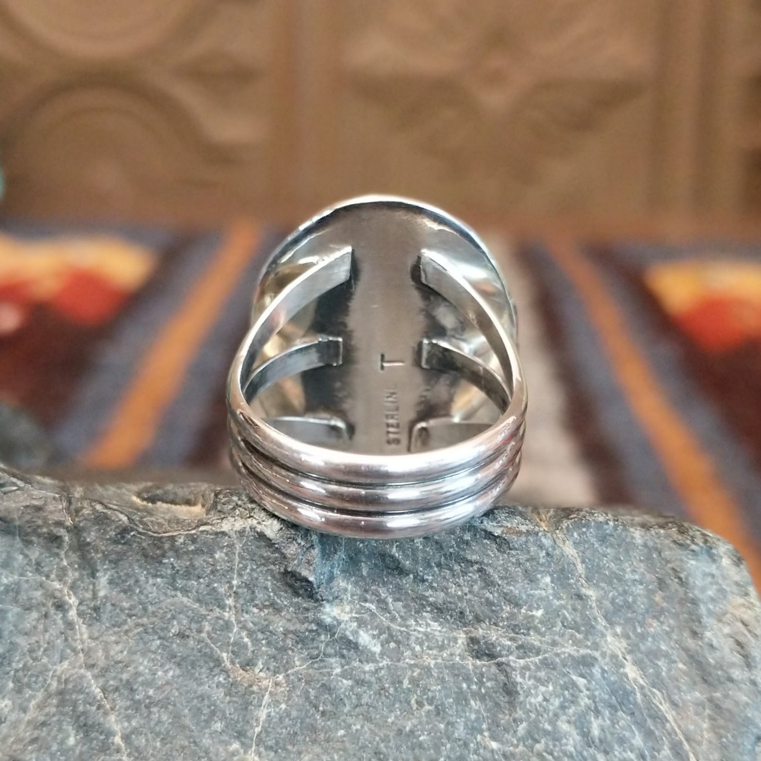 Polished layered band in sterling silver.