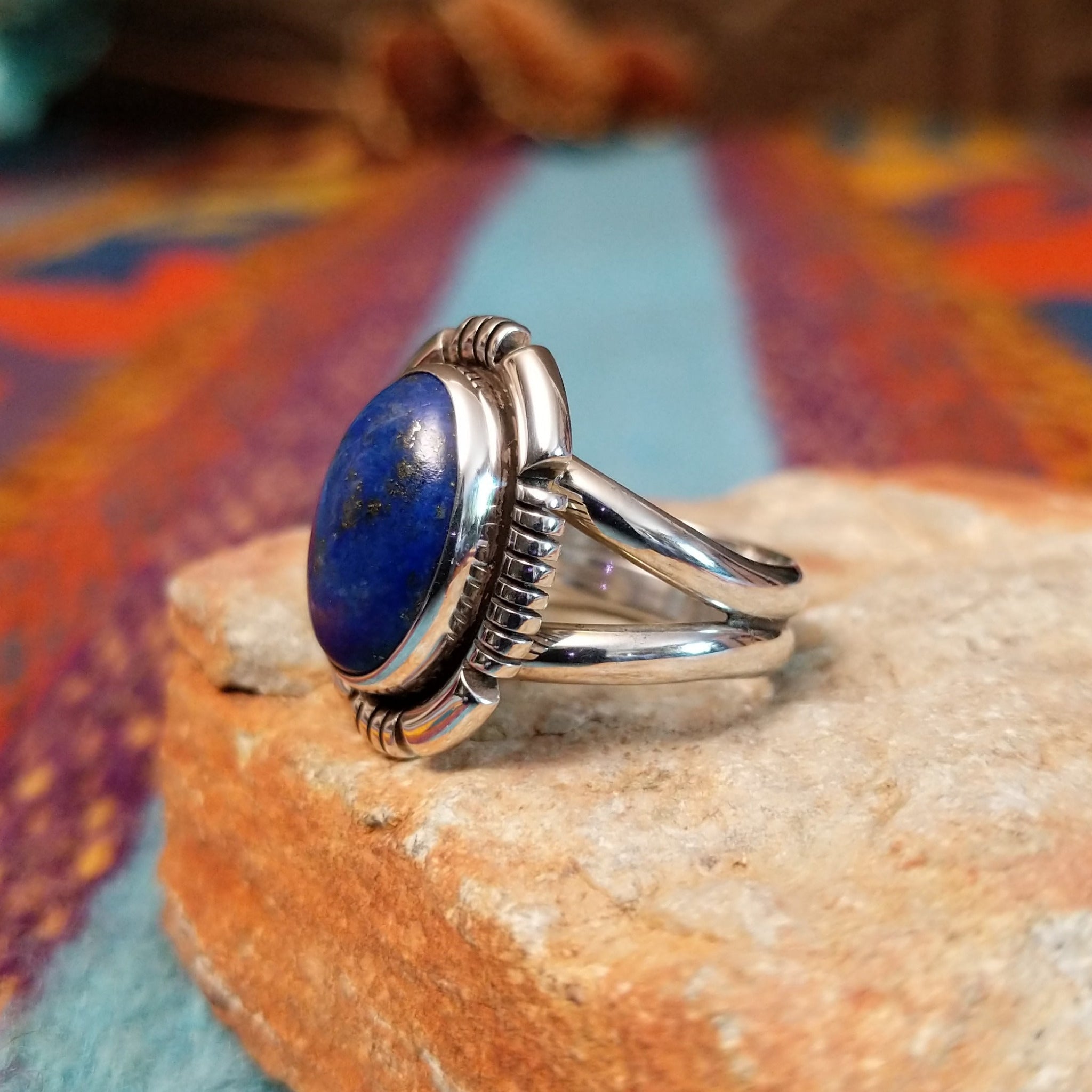 Oval lapis silver ring by Bernyse Chavez with graduated geometric silverwork.
