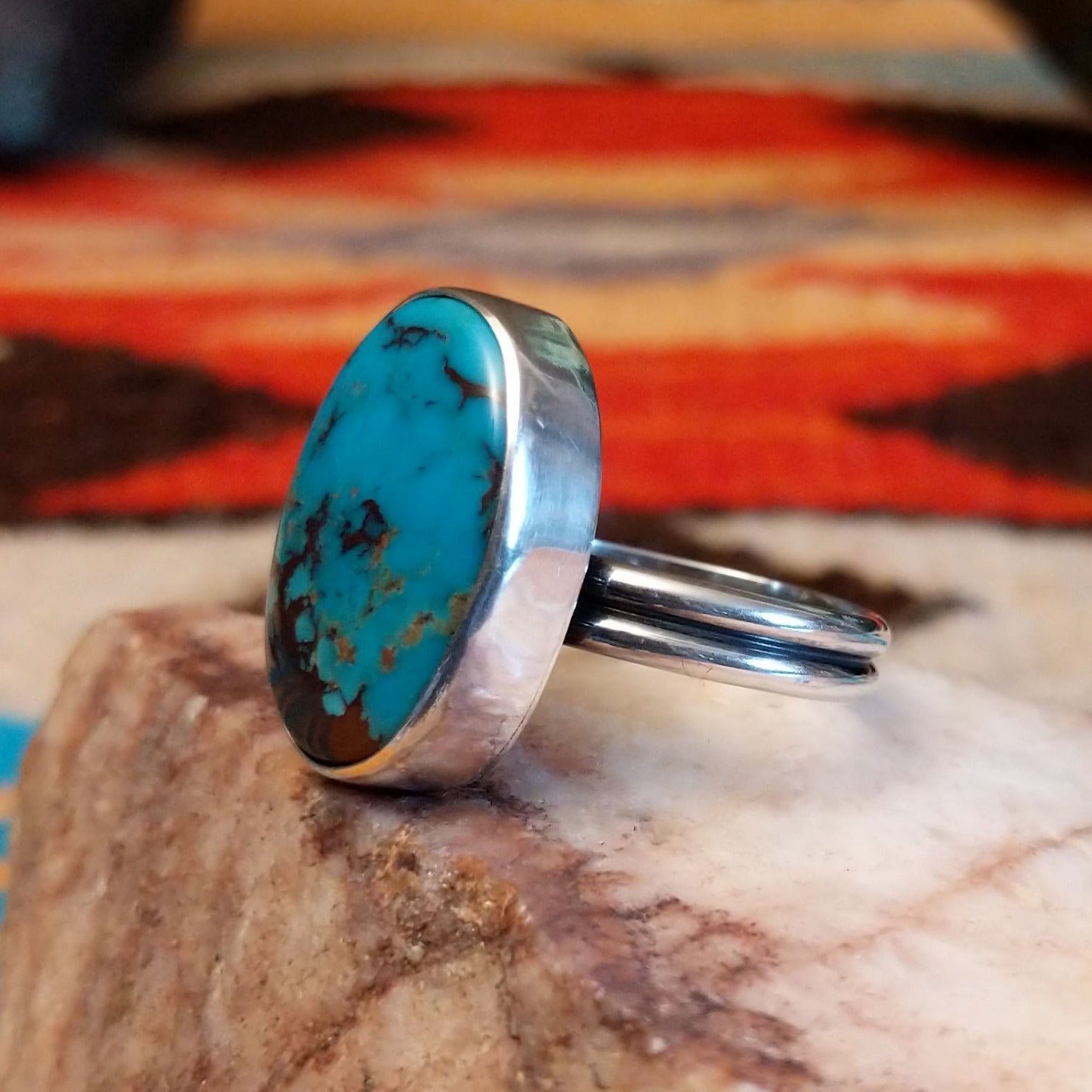Sterling silver ring with Kingman turquoise set in the large, oval bezel.