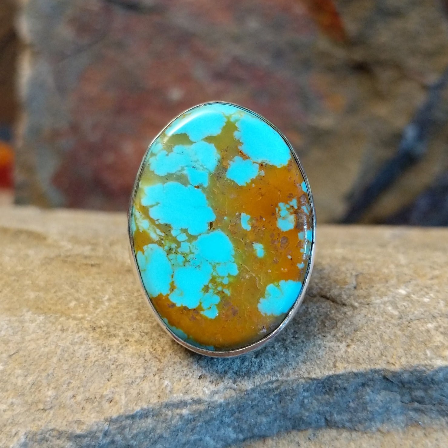 #8 Turquoise oval ring by Navajo artists Everett & Mary Teller. Set in sterling silver. Size 7