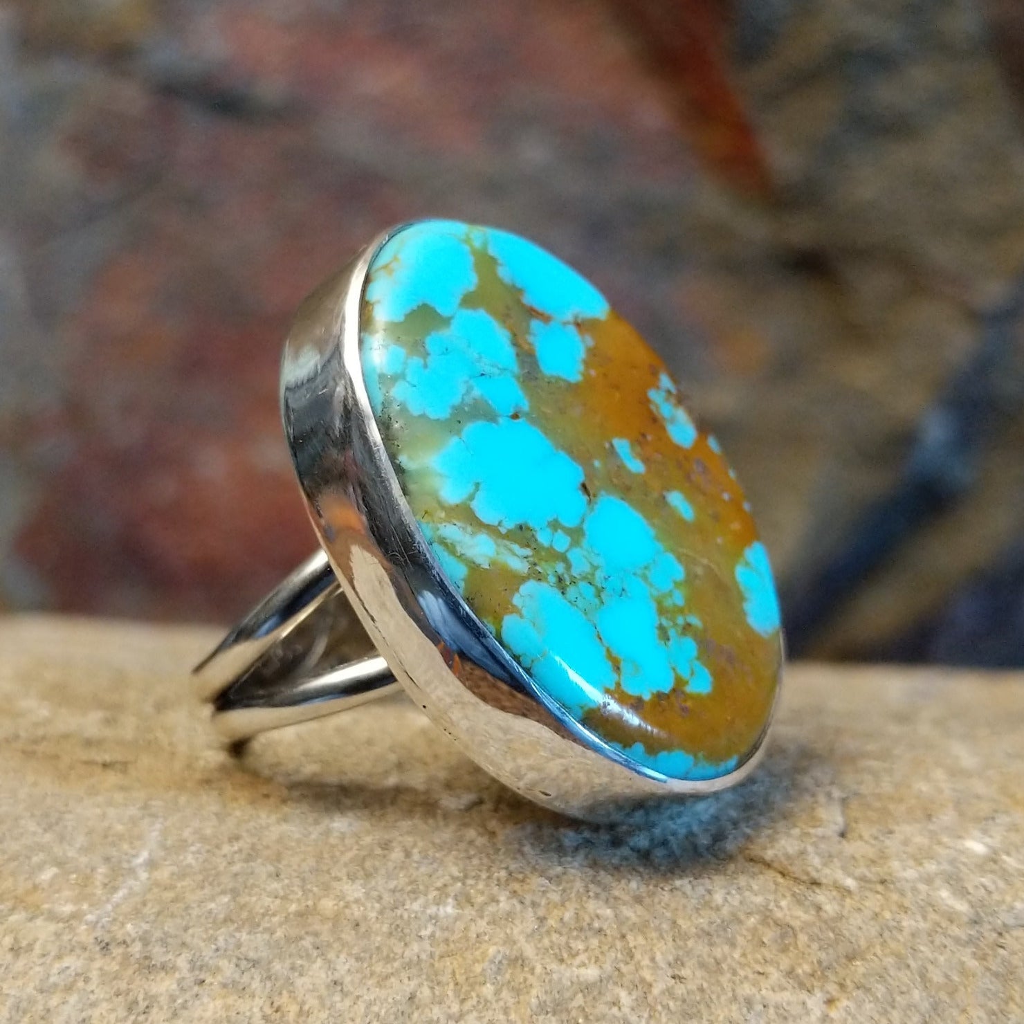#8 Turquoise oval ring by Navajo artists Everett & Mary Teller. Set in sterling silver. Size 7