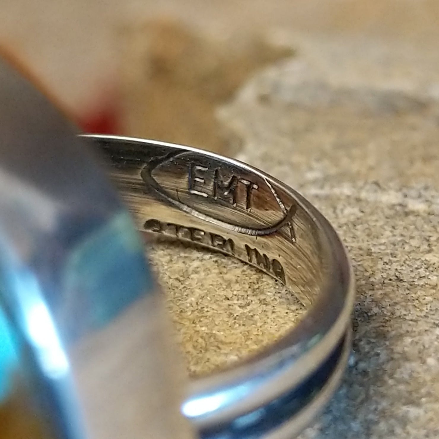 Artisan and Sterling stamp on band.